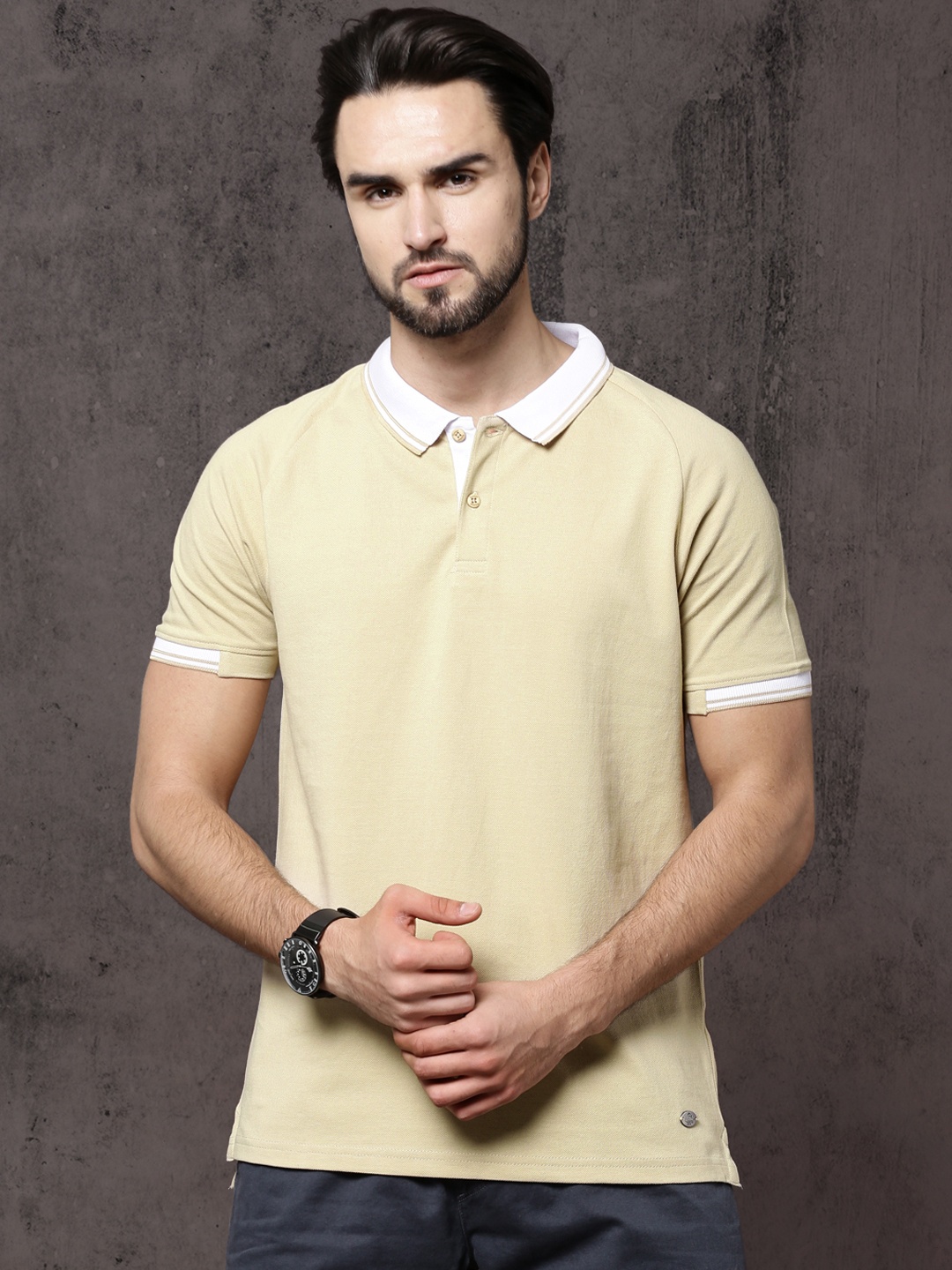 

Roadster Men Beige Solid Polo Collar T-shirt