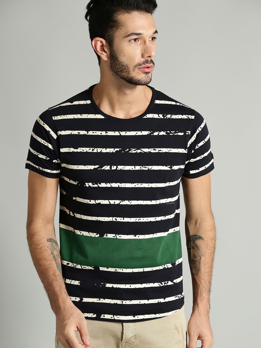 

Roadster Men Navy Blue & Off-White Striped Round Neck T-shirt