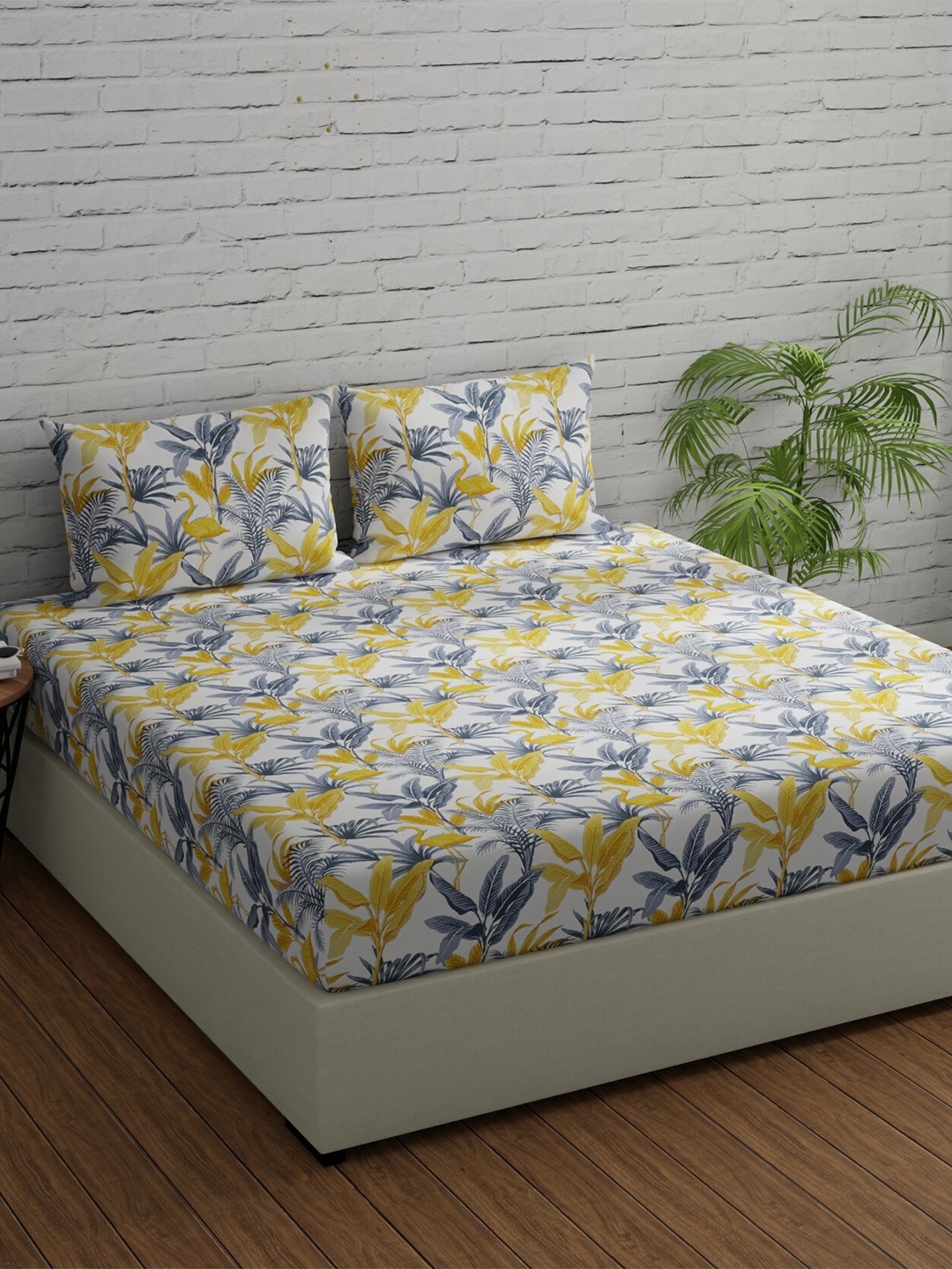 

Huesland Comfort Yellow & White Floral 144 TC Cotton Single Bedsheet with 1 Pillow Cover