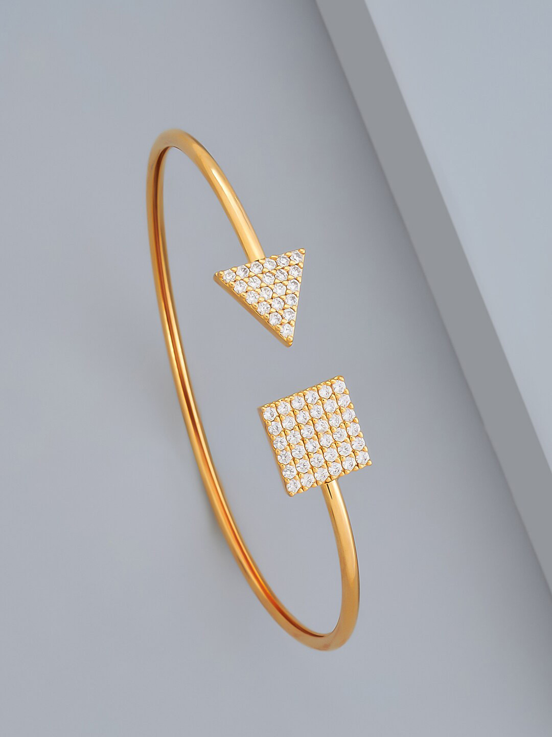 

Kushal's Fashion Jewellery Cubic Zirconia Gold-Plated Cuff Bracelet