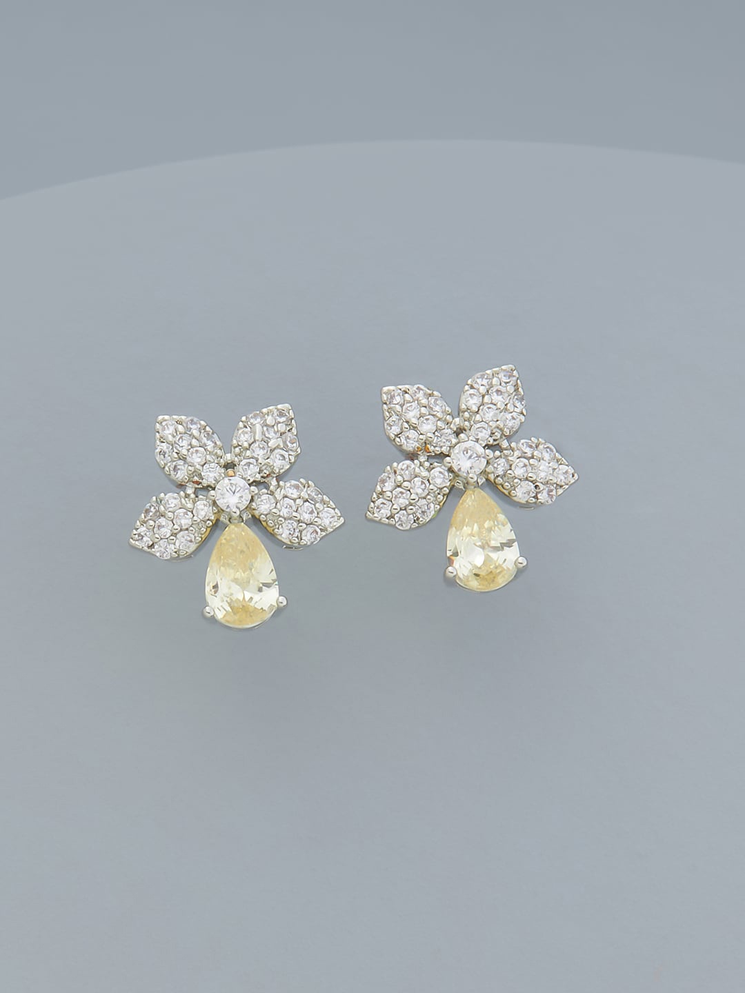 

Kushal's Fashion Jewellery Rhodium Plated Floral Studs Earrings, Yellow