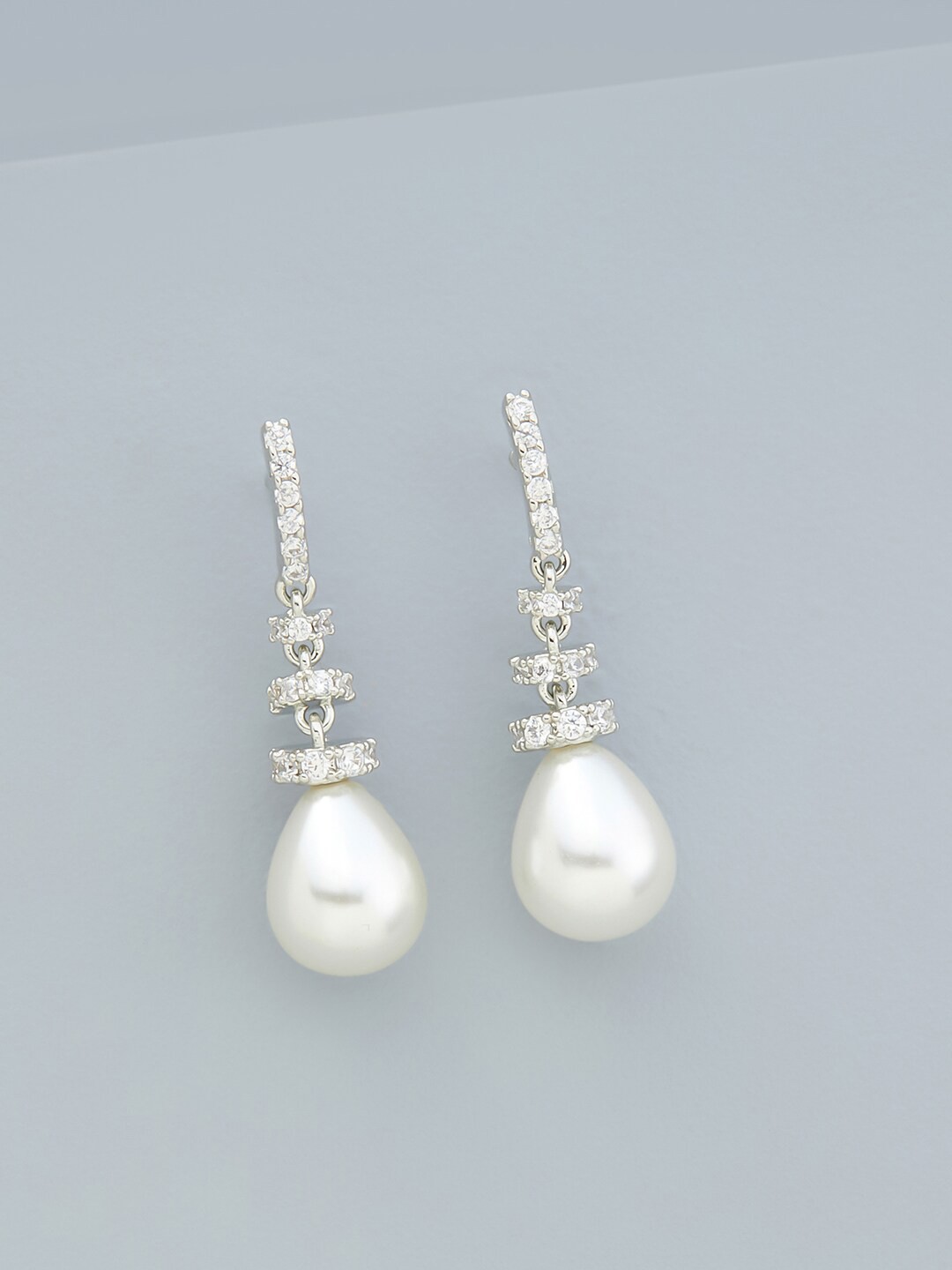

Kushal's Fashion Jewellery Rhodium-Plated Cubic Zirconia Teardrop Shaped Drop Earrings, Gold