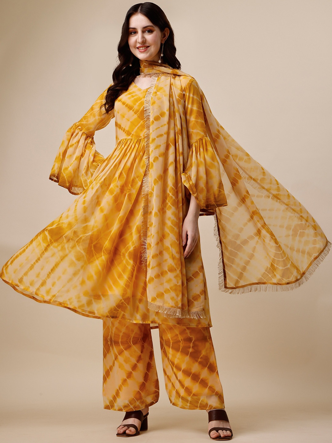 

Vaidehi Fashion Leheriya Dyed Regular Kurti With Palazzos & Dupatta, Yellow