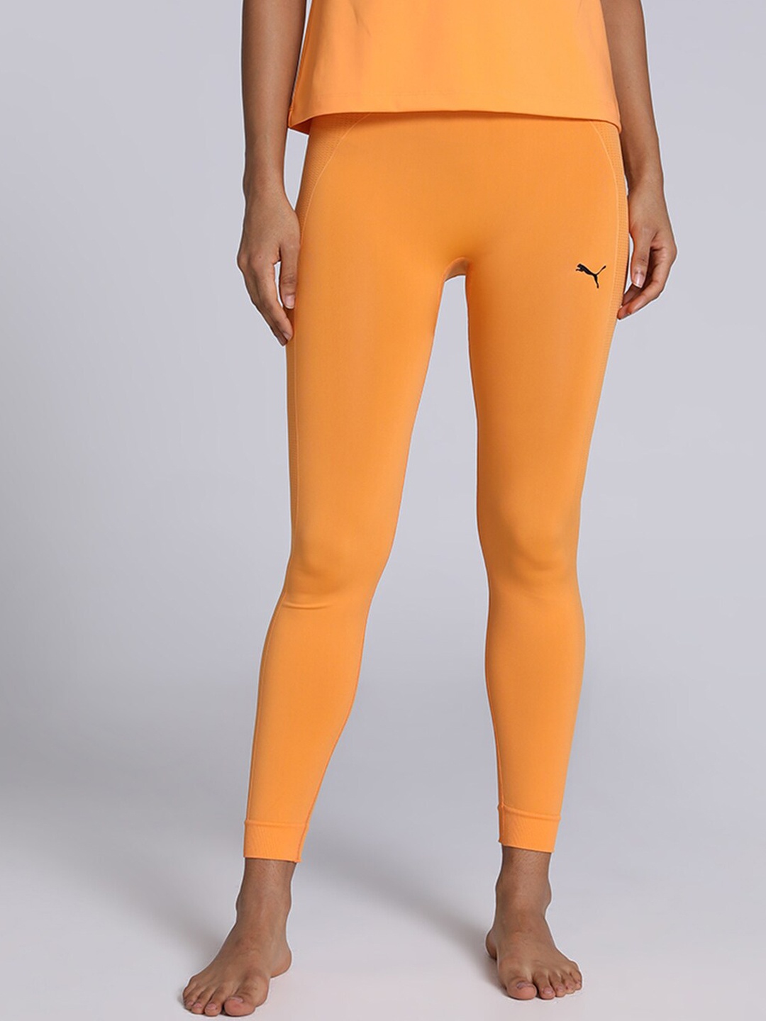 

Puma Women Studio Foundation Seamless Yoga Tights, Orange