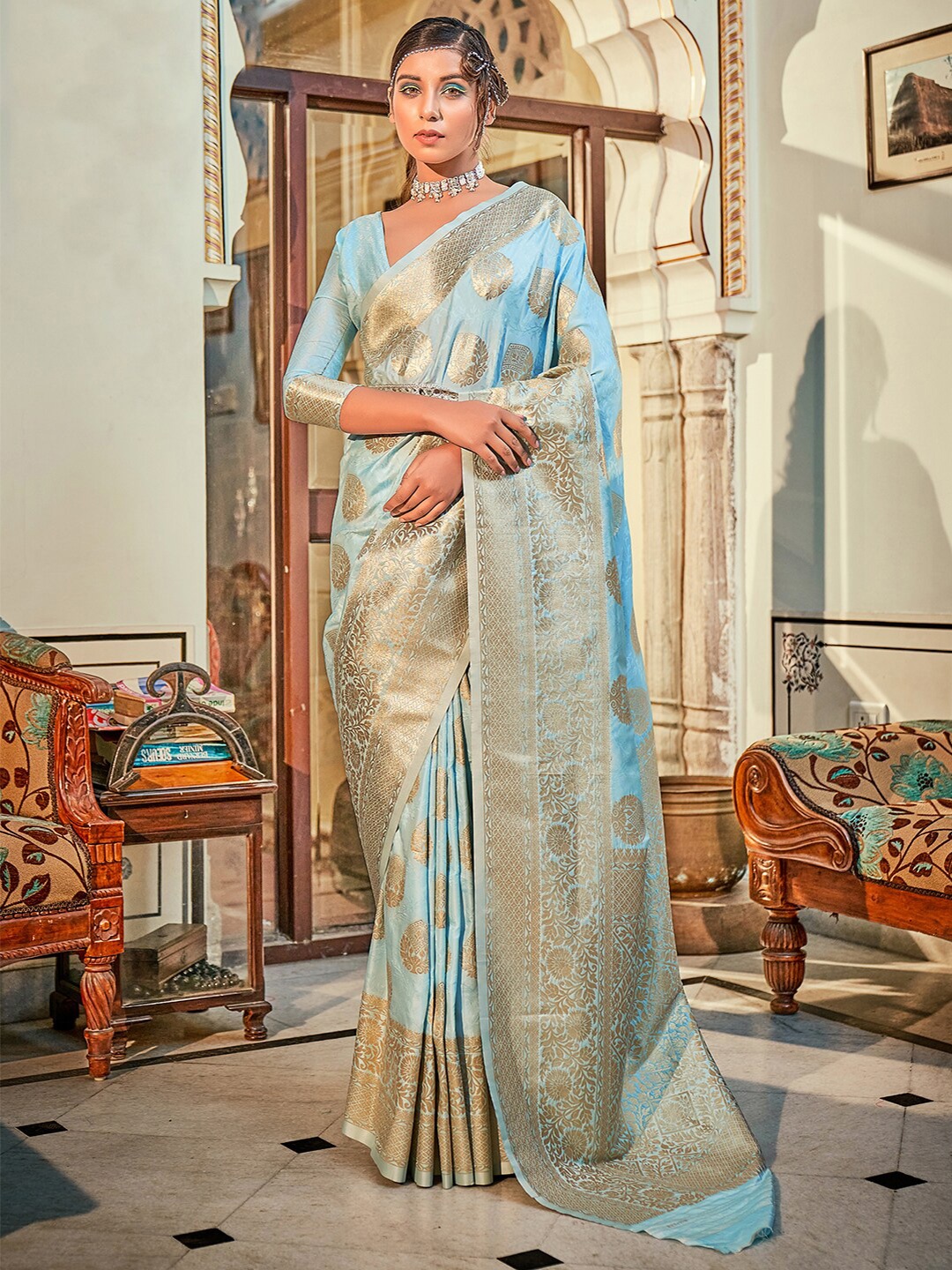 

Mitera Turquoise Blue & Gold-Toned Ethnic Motif Woven Design Zari Banarasi Saree