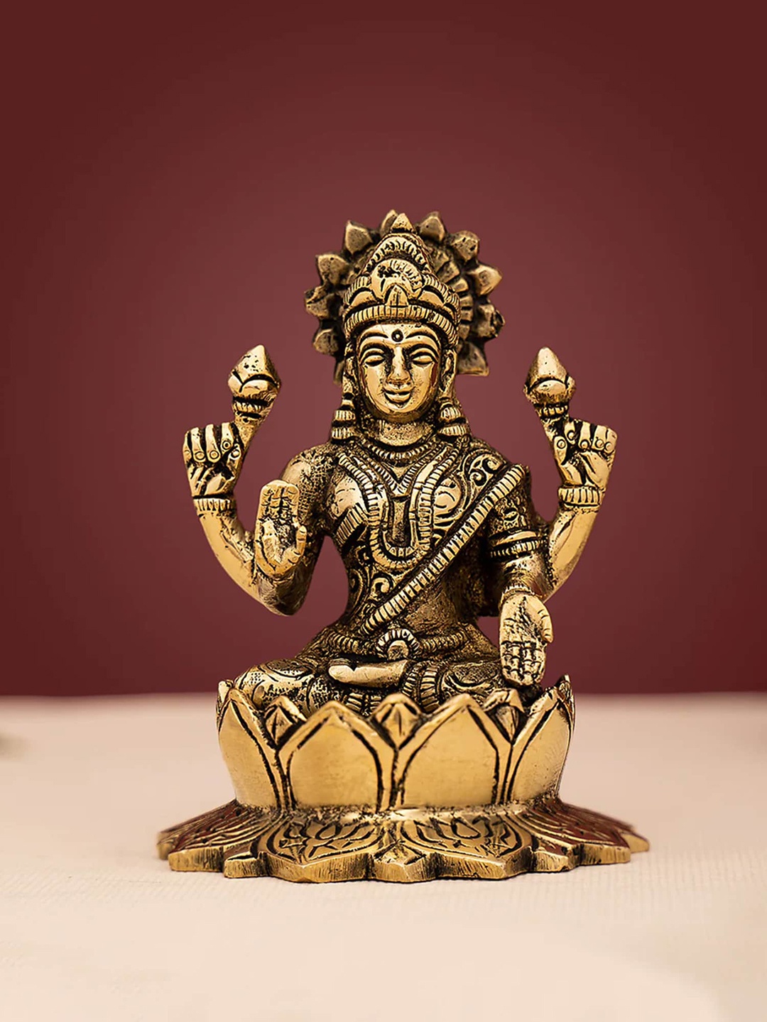 

DecorTwist Metallic-Toned Textured Goddess Lakshmi Idol Showpiece