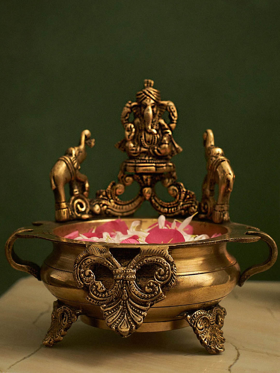 

DecorTwist Gold-Toned Traditional Decorative Ganesh Brass Urli Bowl with Elepahant Design