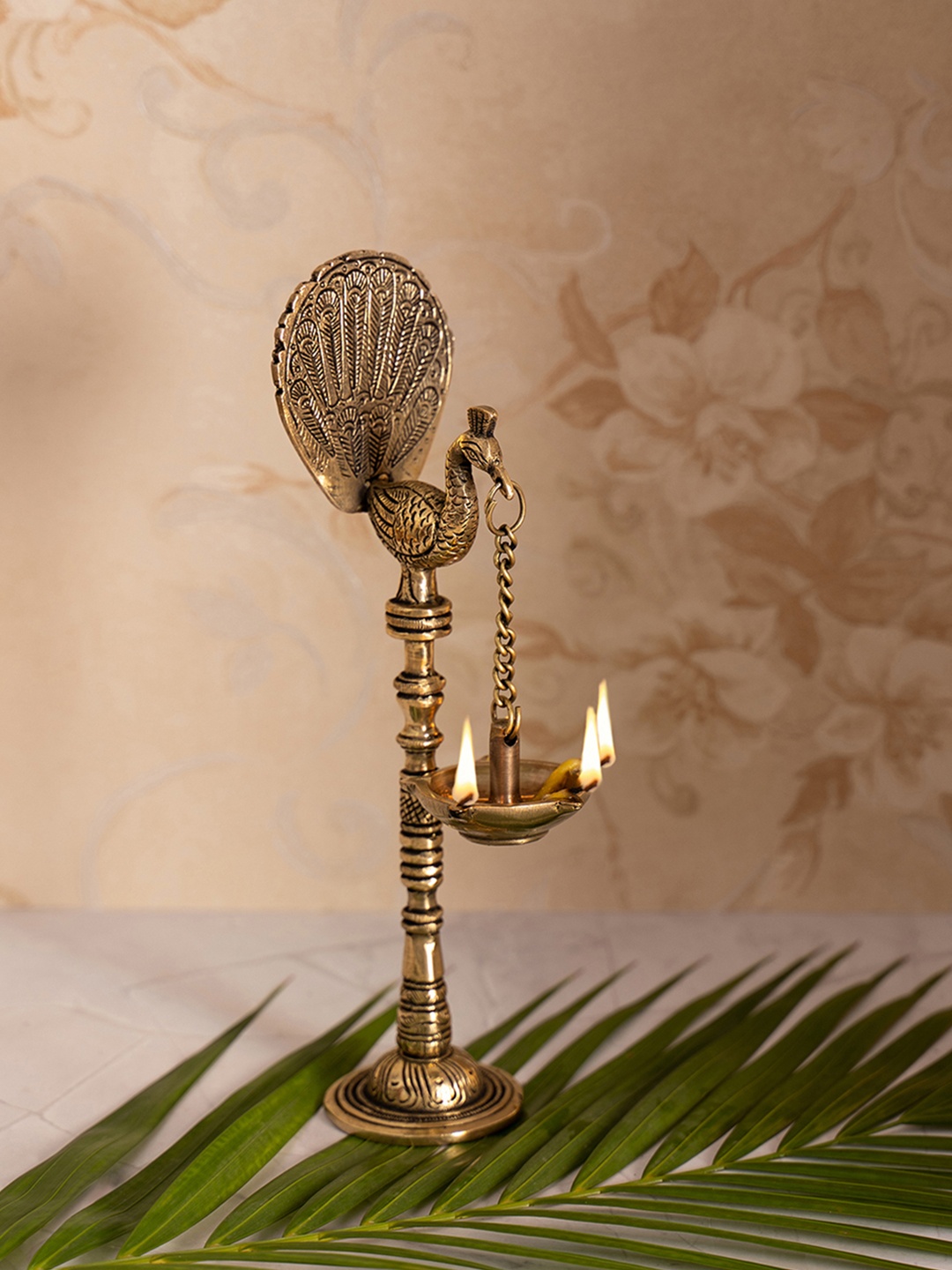 DecorTwist Gold-Toned Brass Peacock Design Hanging Diyas