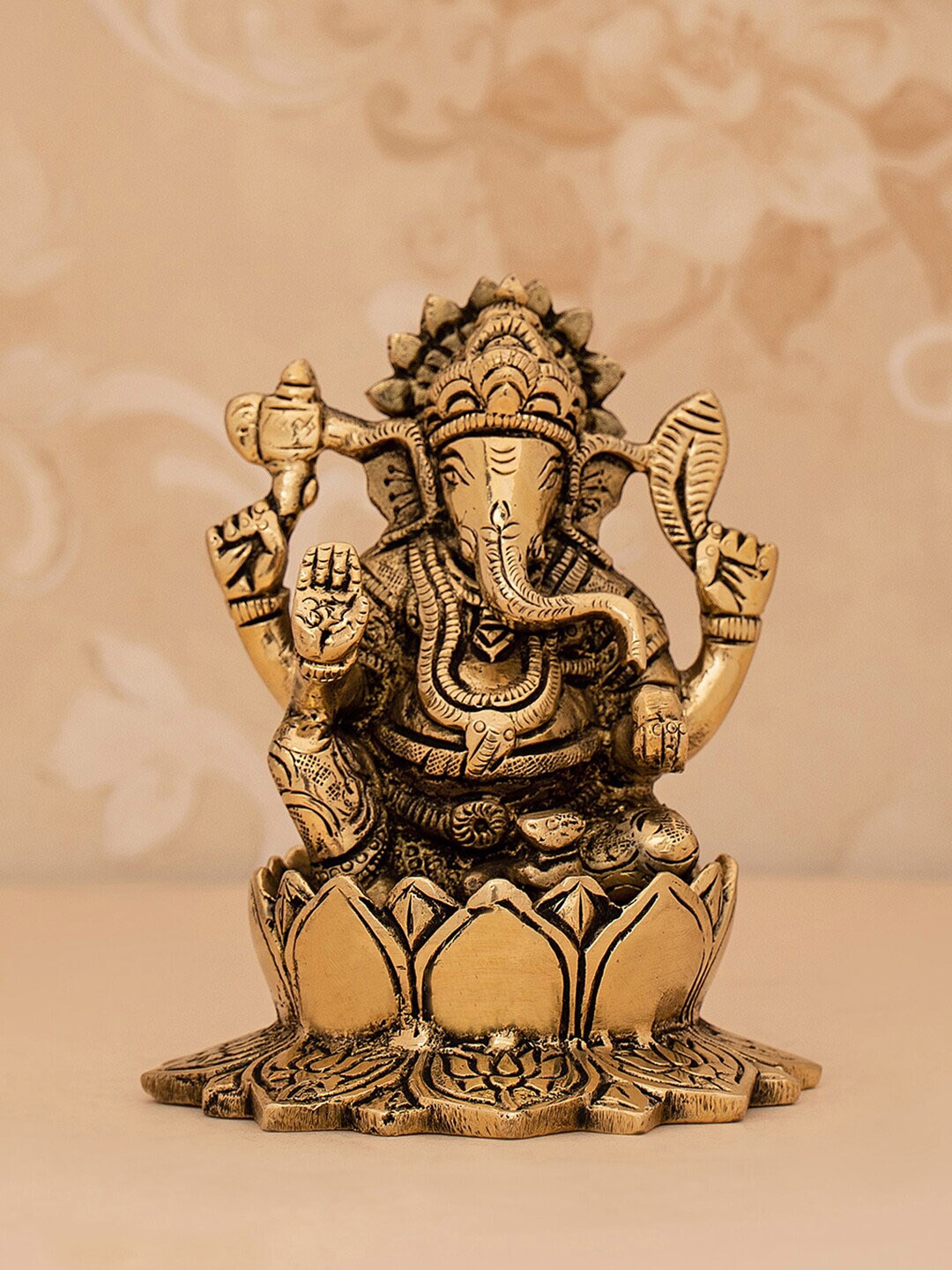 

DecorTwist Metallic-Toned Textured Ganesha Idol Showpiece