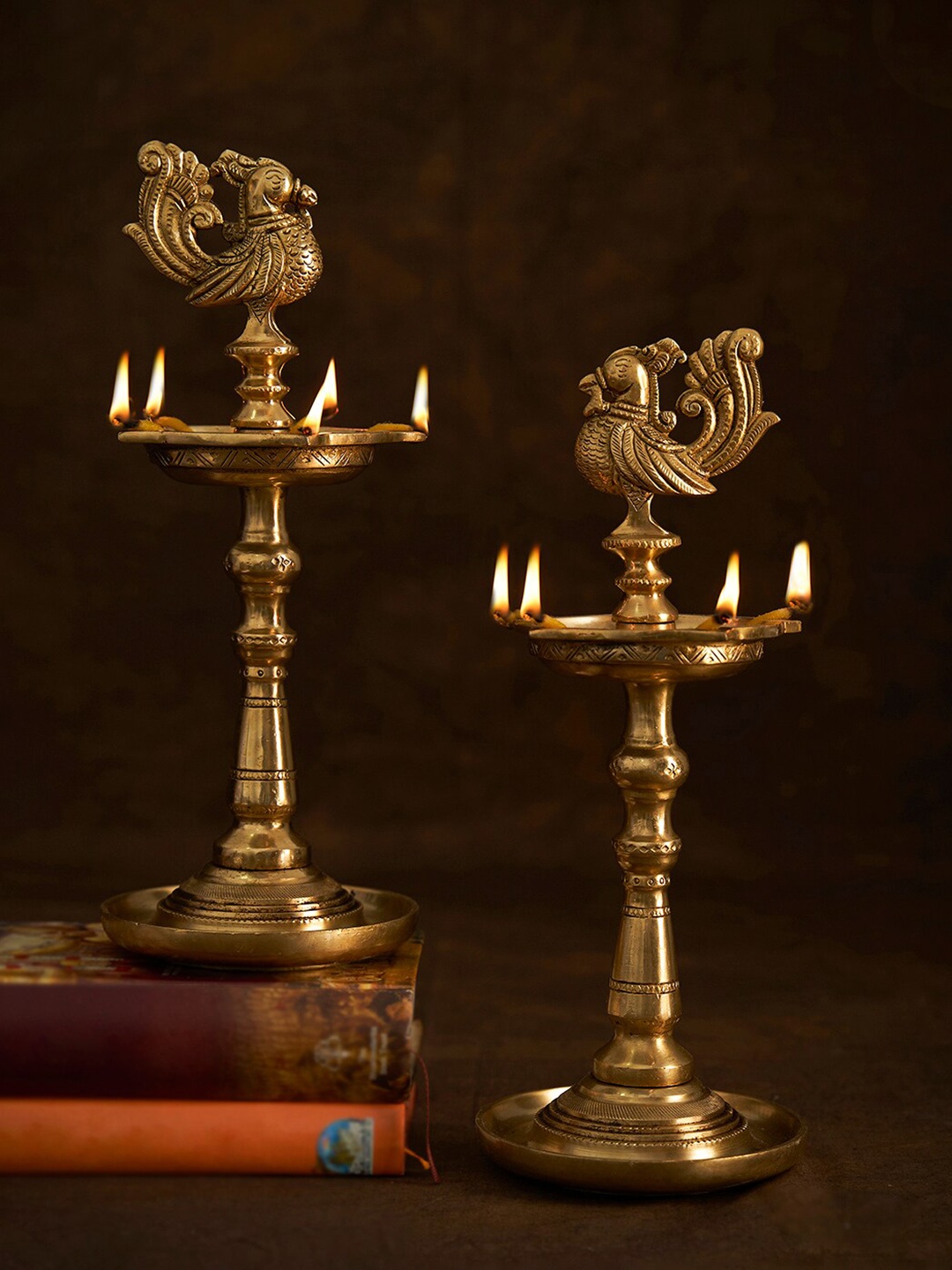 

DecorTwist Gold Toned Annapakshi Design Brass Oil Lamp