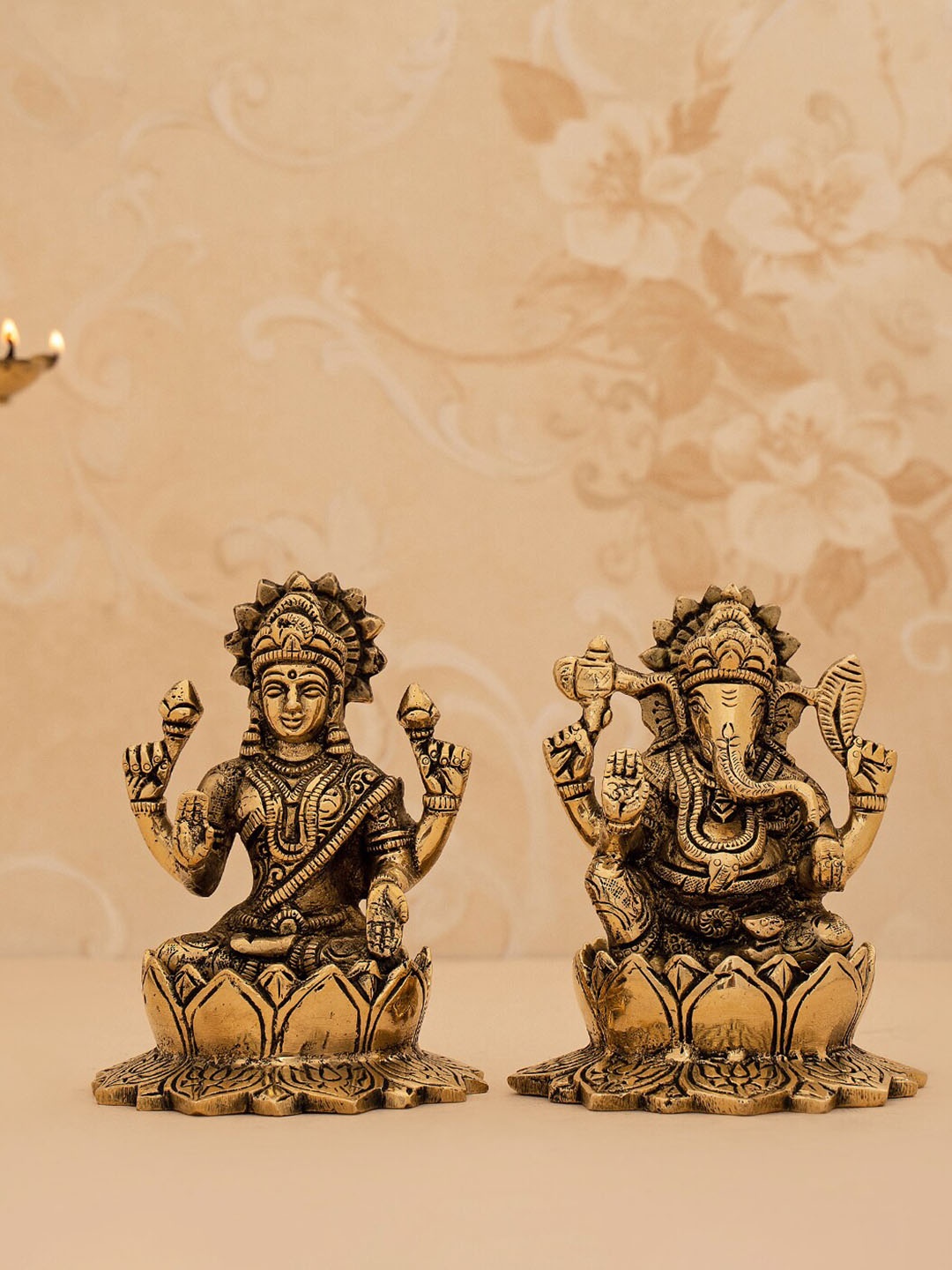 

DecorTwist Metallic-Toned 2 Pieces Textured Lord Ganesha & Lakshmi Idol Showpieces