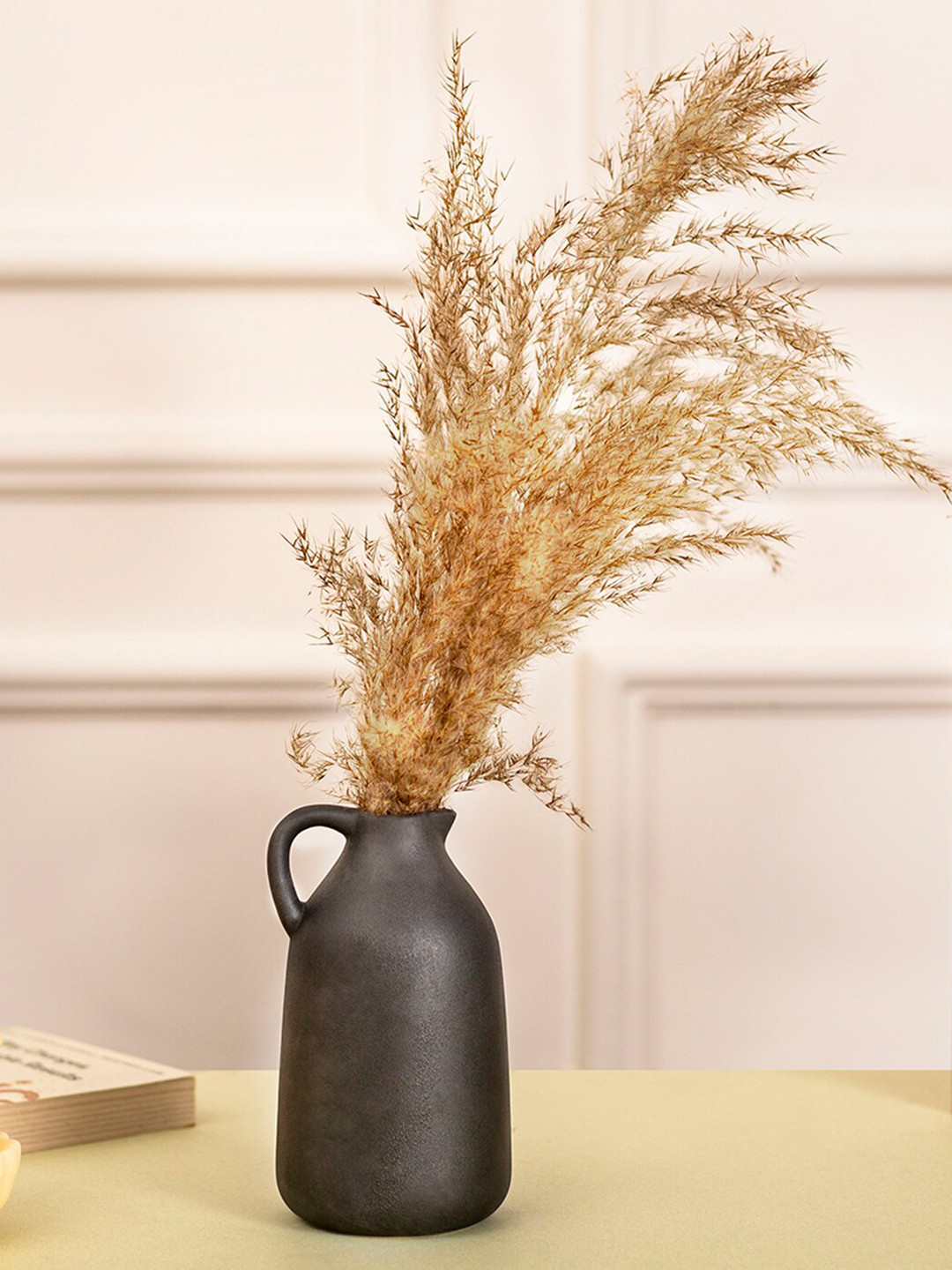 

DecorTwist Black Cermaic Vase Showpiece