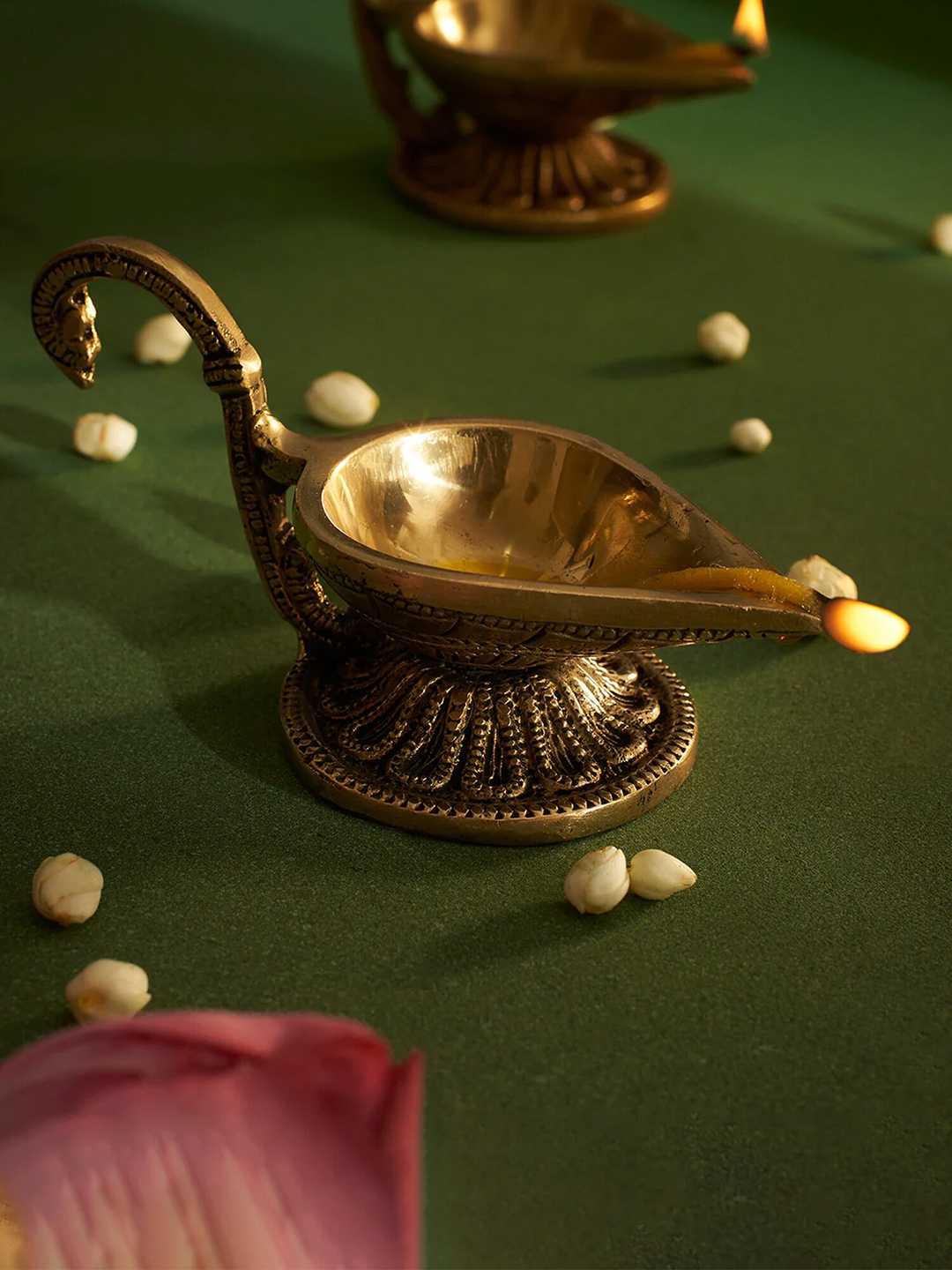 

DecorTwist Gold-Toned Antique Brass Diya With Handle