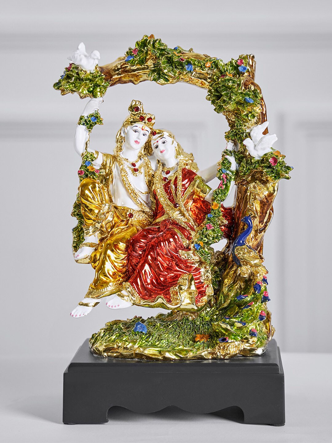 

DecorTwist White and Red Textured Radha Krishna Idol Showpiece