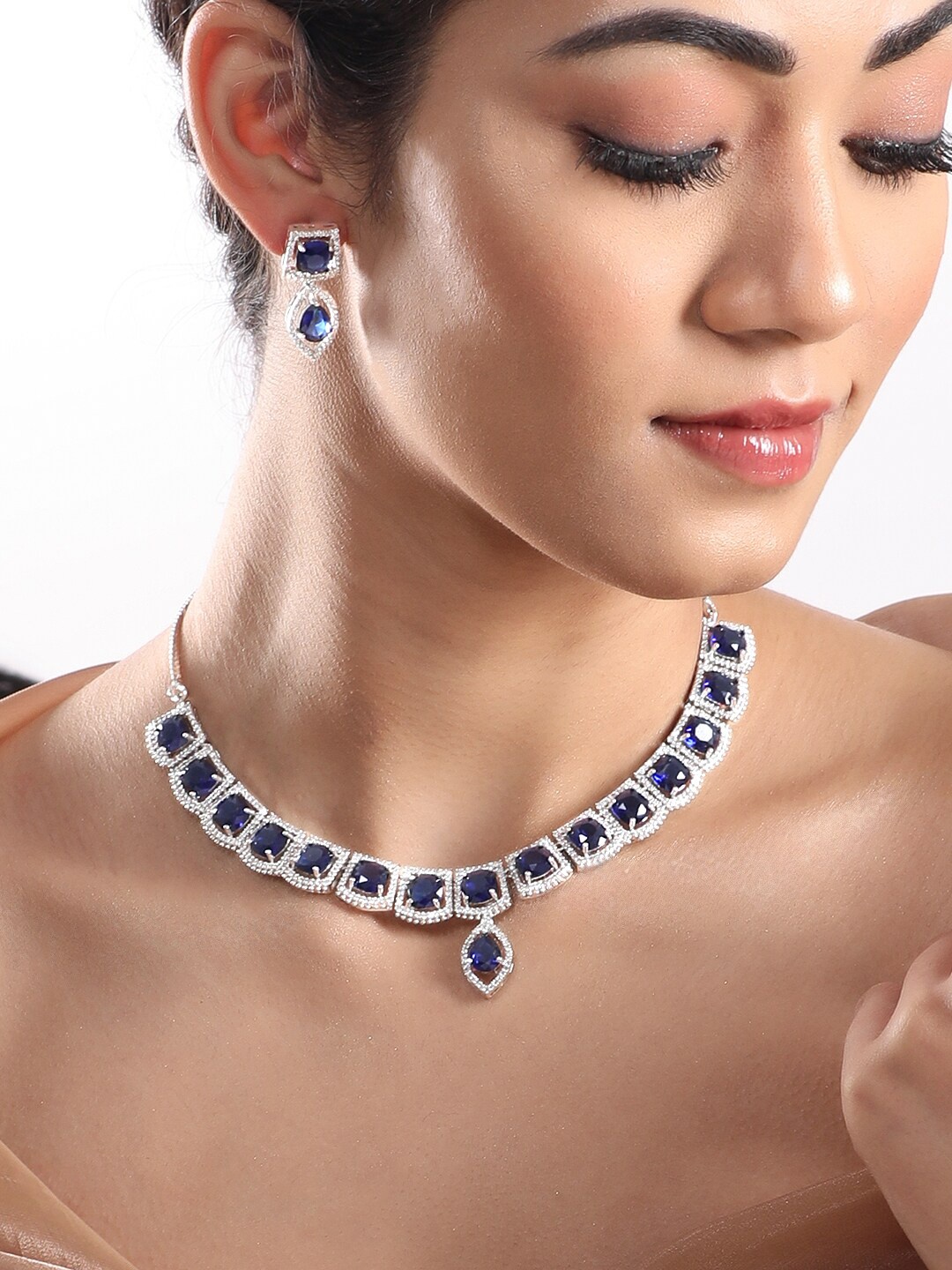 

Rubans Rhodium Plated Premium White & Blue Sapphire Zircons Necklace Set., Silver