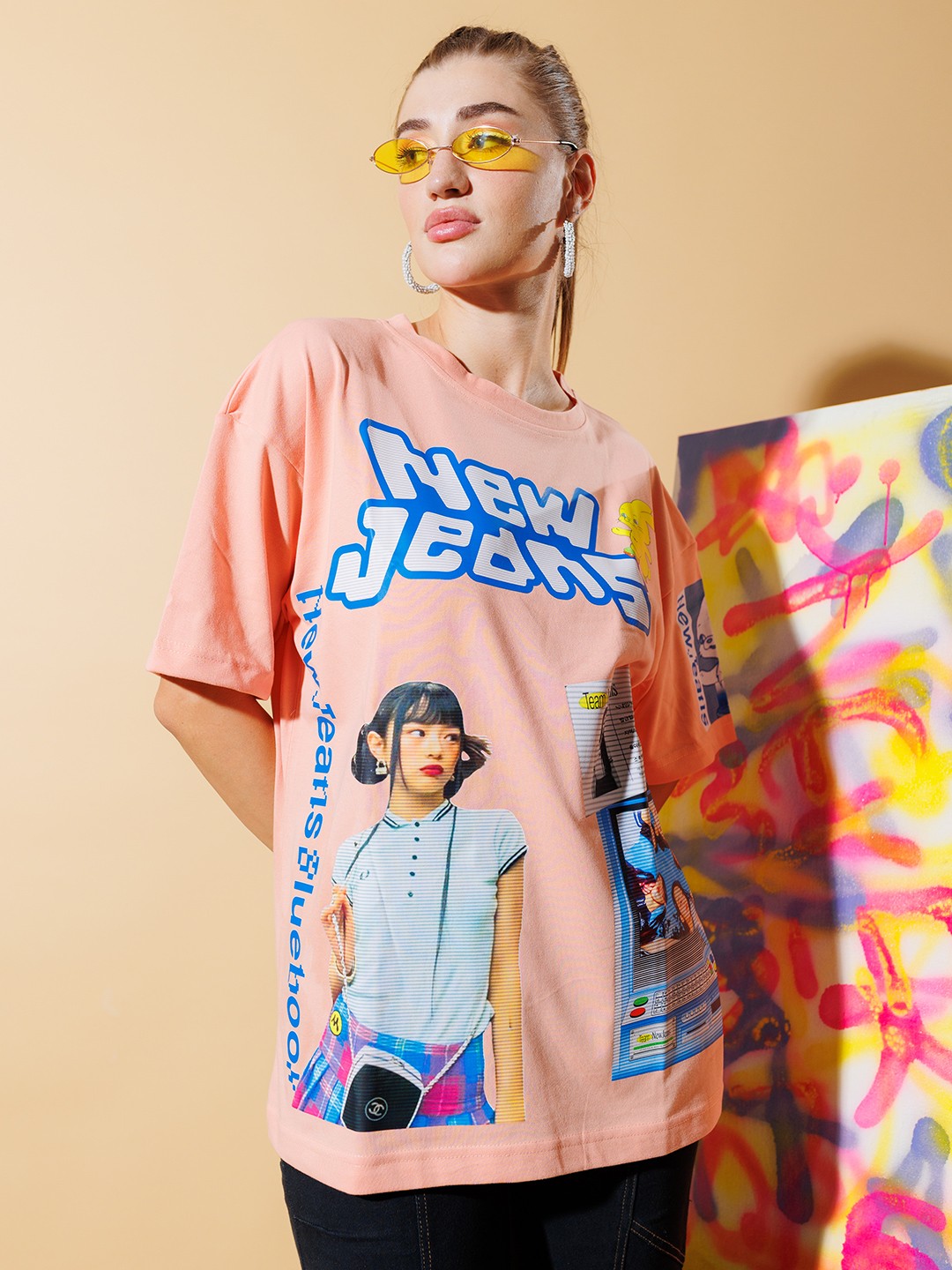 

Stylecast X Hersheinbox Black Pink Graphic Printed Pure Cotton Oversized Longline T-shirt, Peach