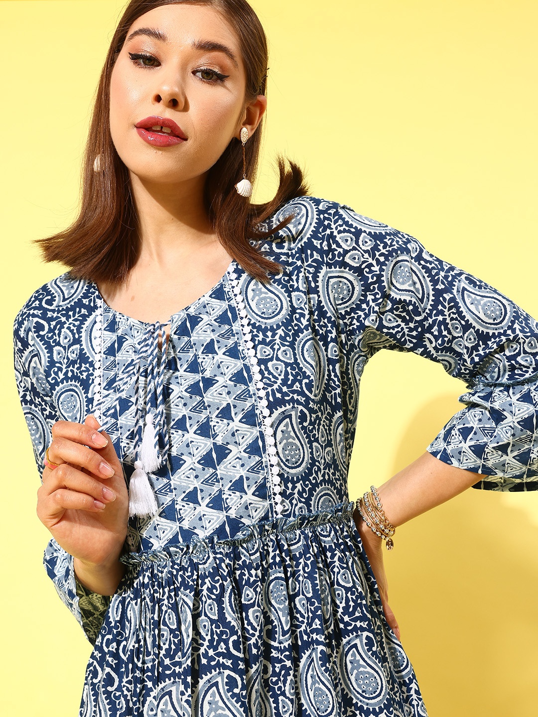 

Yufta Navy Blue Ethnic Motifs Print Tie-Up Neck Bell Sleeves Pure Cotton A-Line Dress