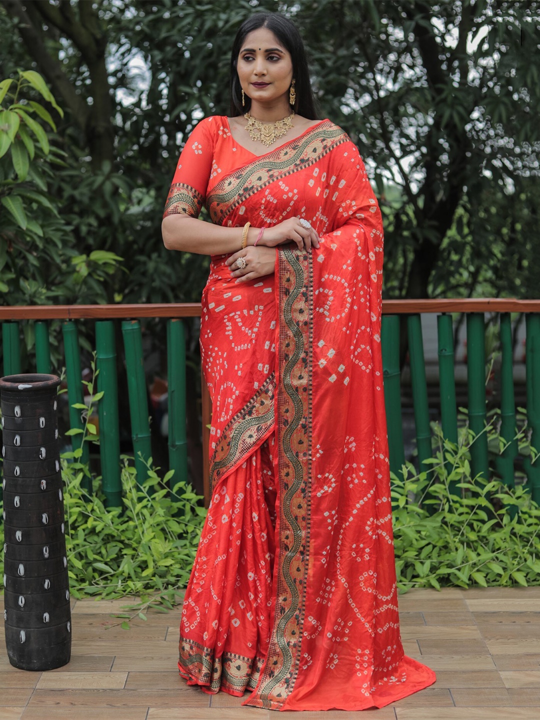 

Mitera Orange & White Bandhani Zari Silk Blend Bandhani Saree