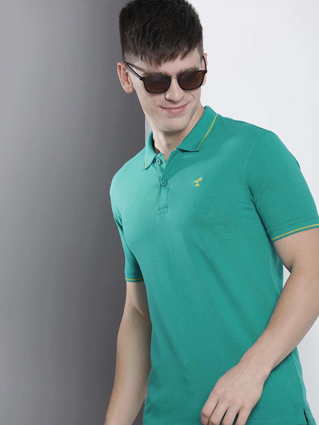 

The Indian Garage Co Men Solid Polo Collar T-shirt, Green