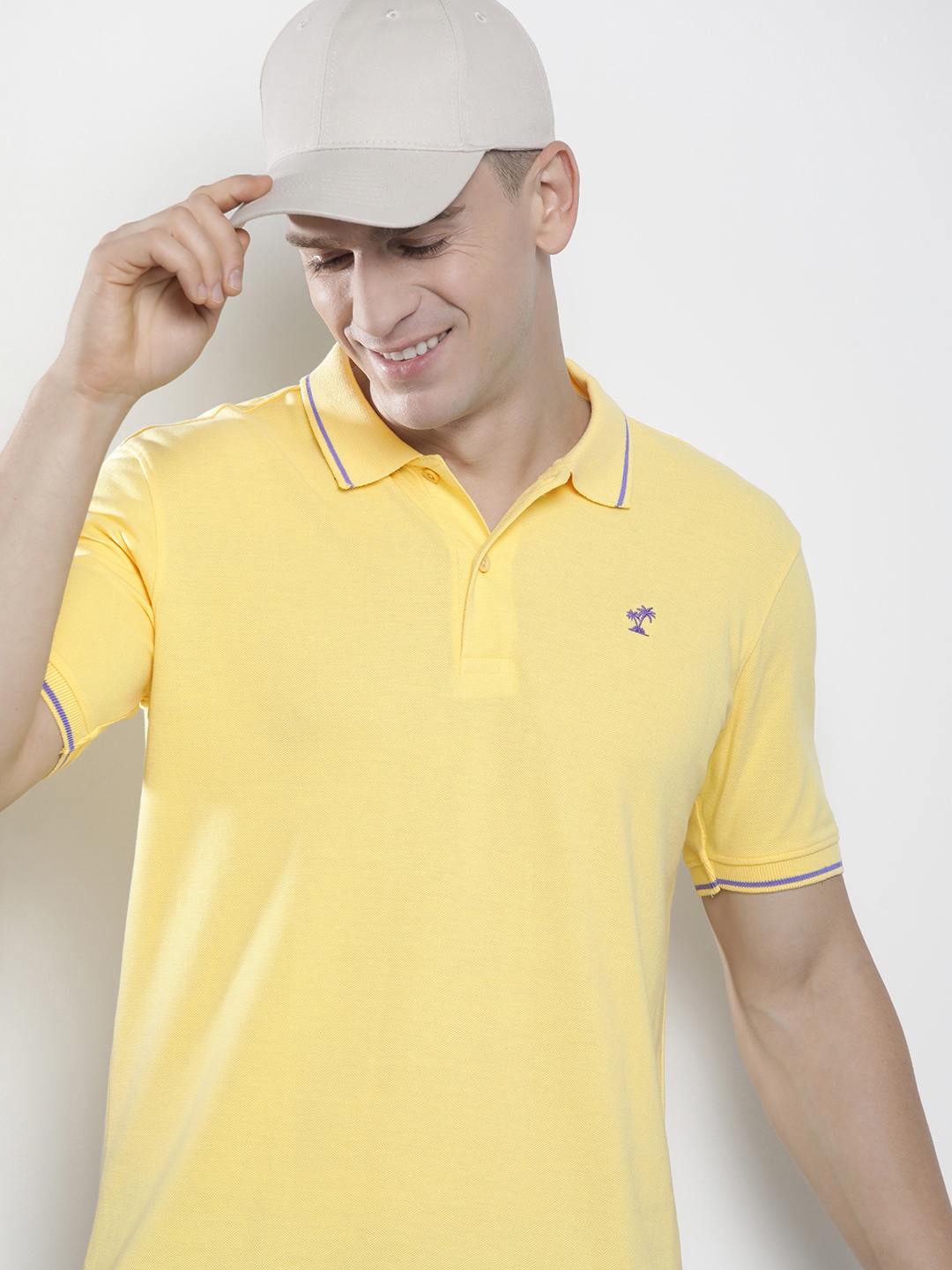 

The Indian Garage Co Men Solid Polo Collar T-shirt, Yellow