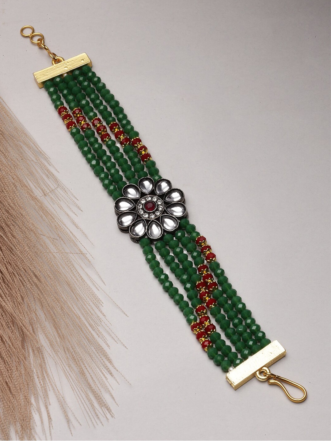 

Kennice Gold-Plated Kundan Multistrand Bracelet