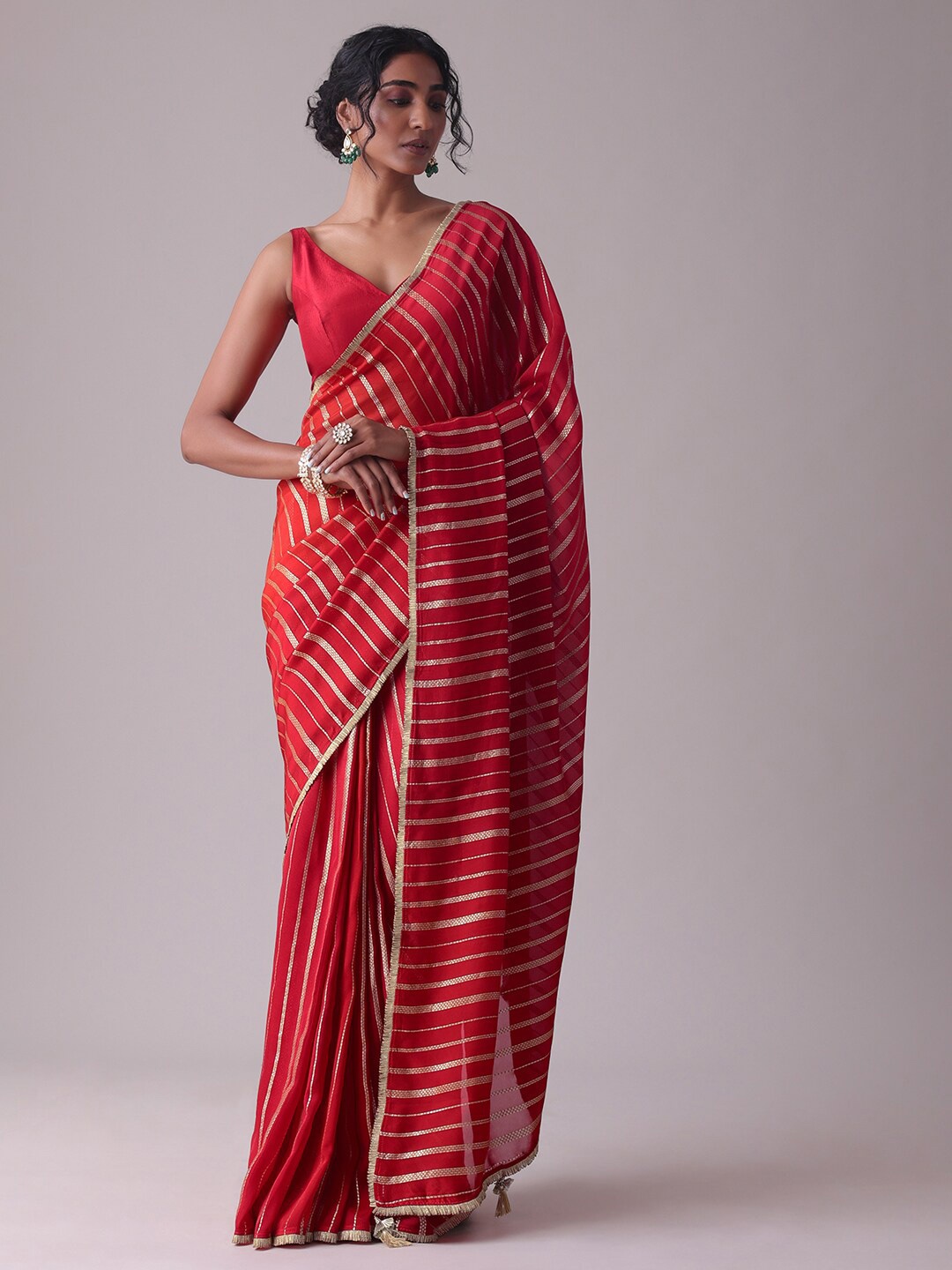 

KALKI Fashion Red & Gold-Toned Striped Organza Saree