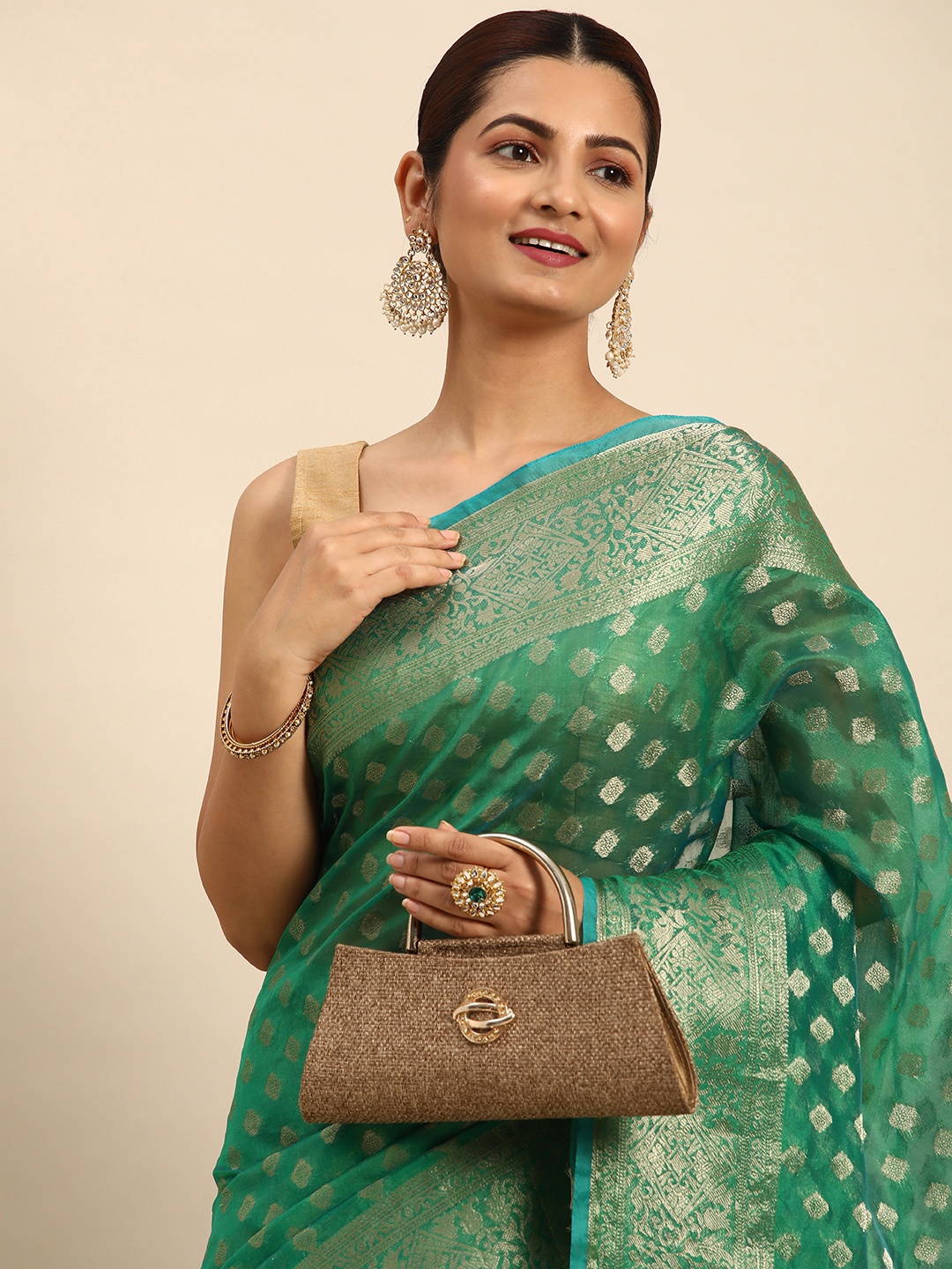 

Indian Women Green & Gold-Toned Woven Design Zari Organza Banarasi Saree