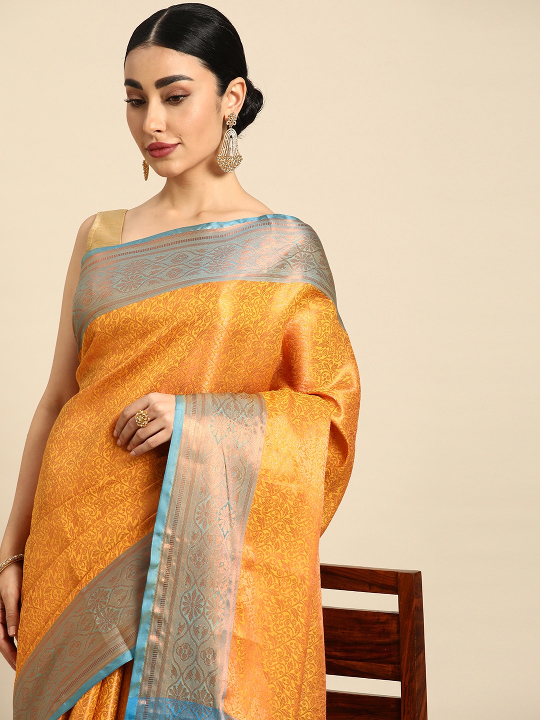 

Mitera Ethnic Motifs Zari Silk Blend Kanjeevaram Saree, Mustard