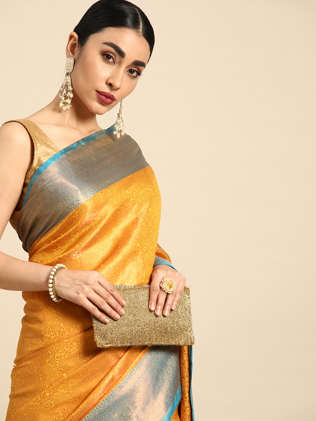 

Mitera Ethnic Motifs Zari Silk Blend Kanjeevaram Saree, Mustard