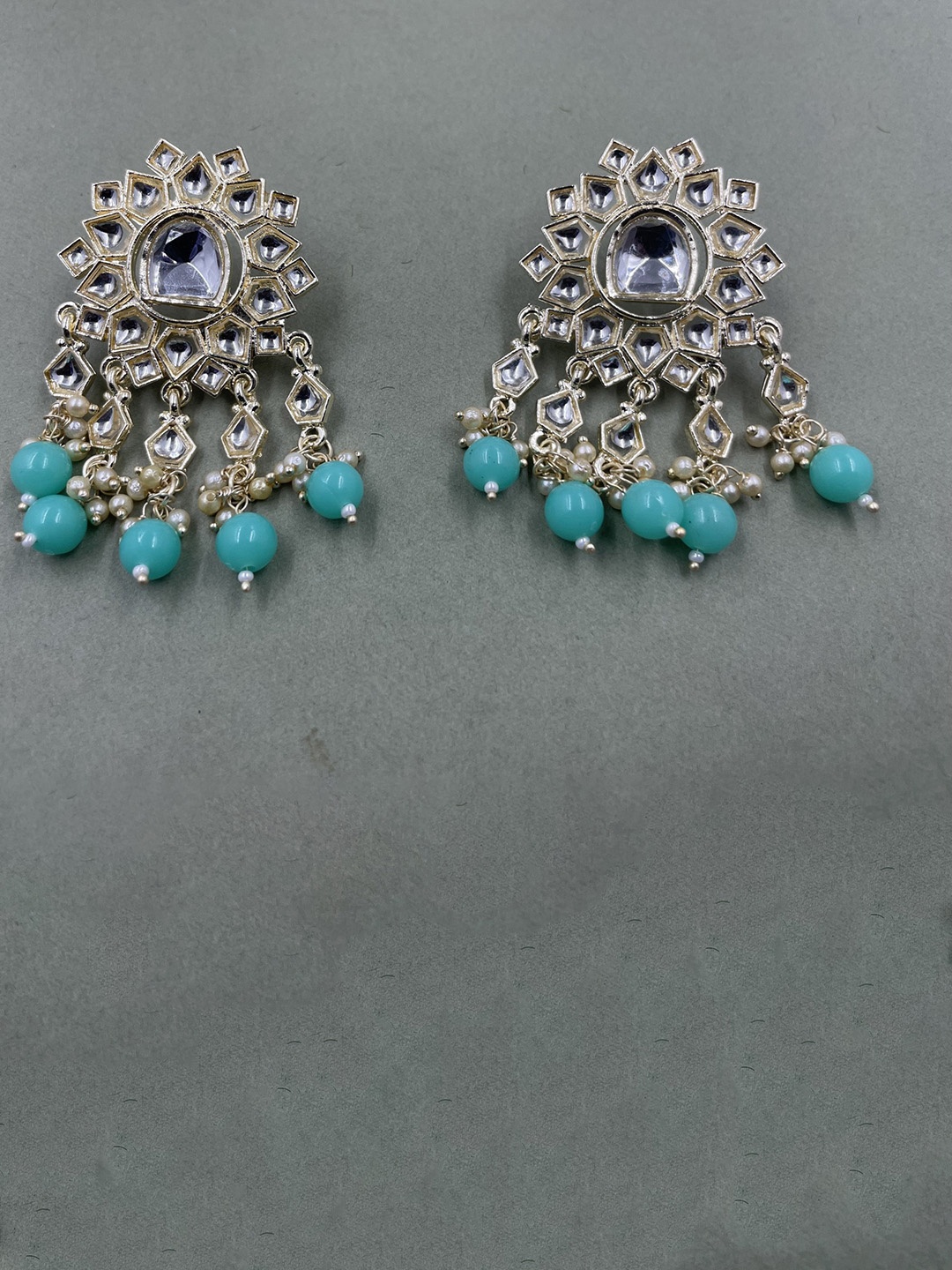 

Rhymee Gold-Plated Contemporary Kundan Studded Drop Earrings