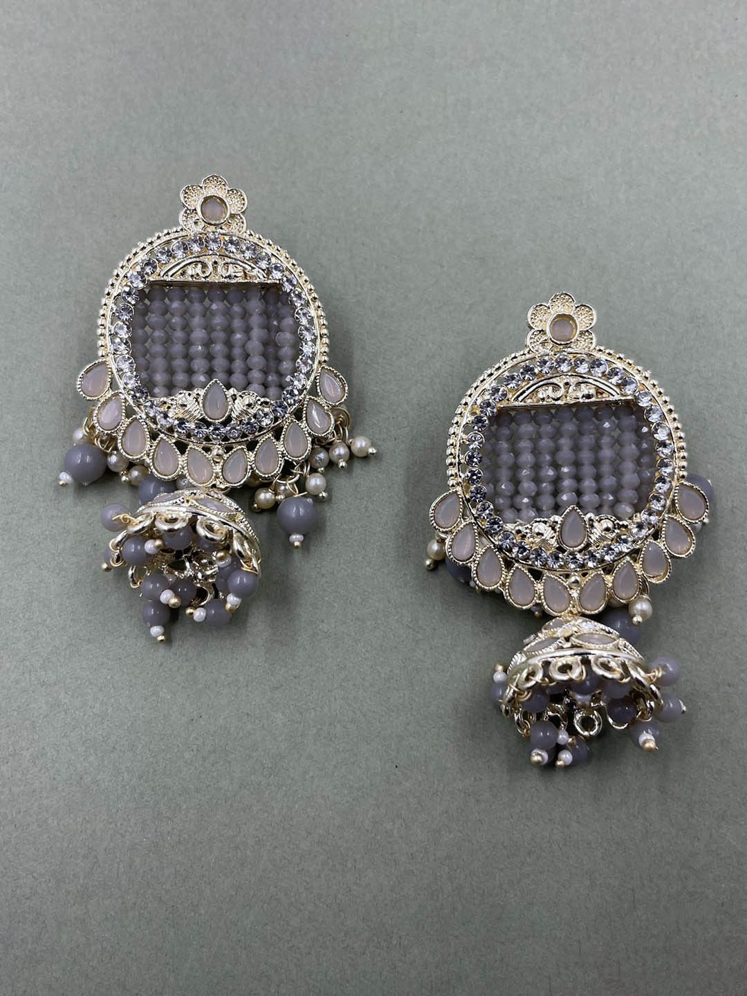 

Rhymee Gold Plated Floral Kundan Studded Jhumkas