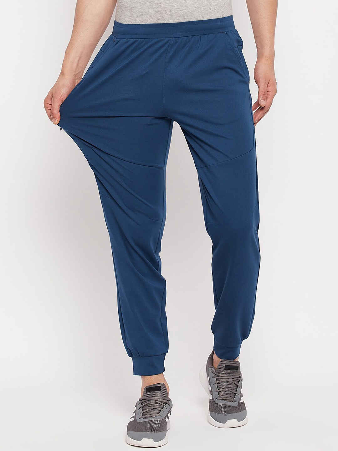 

Okane Men Mid-Rise Regular Fit Sports Joggers, Blue