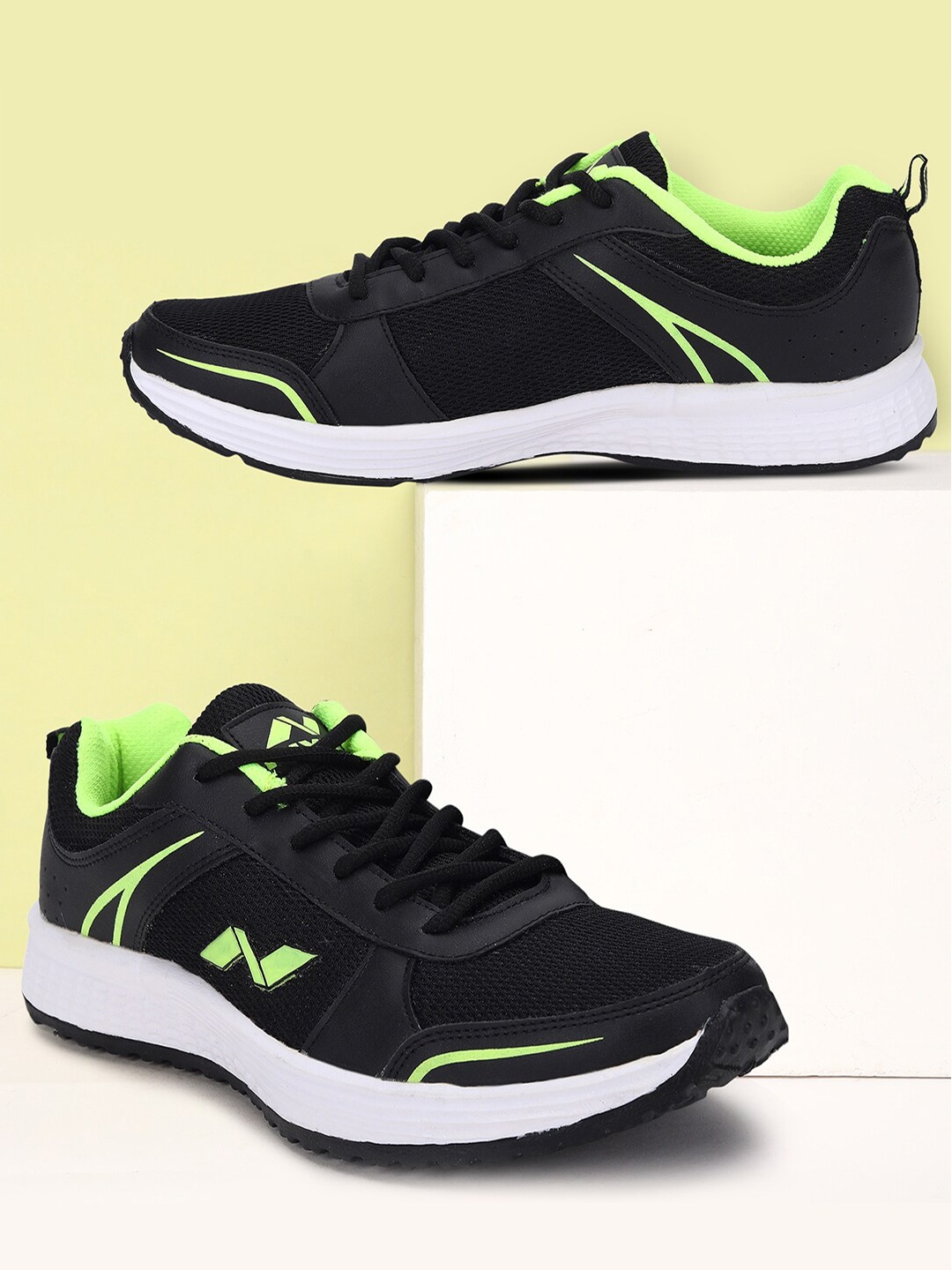 

NIVIA Men Plunk Mesh Non-Marking Jogging Shoes, Black