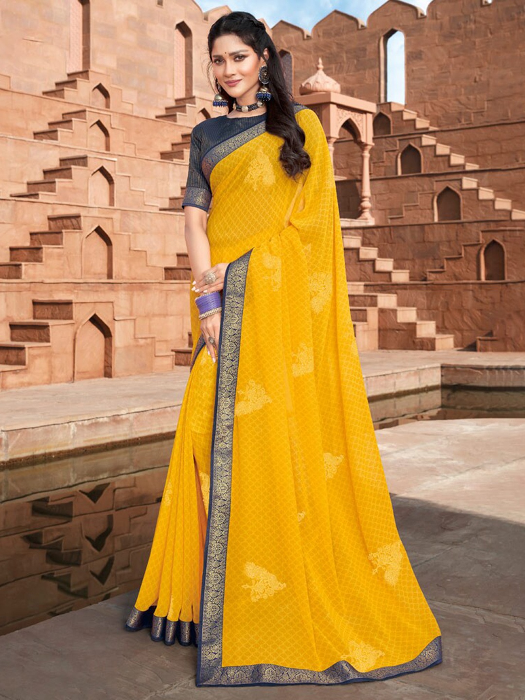 

Vishal Prints Ethnic Motif Zari Poly Georgette Saree, Yellow