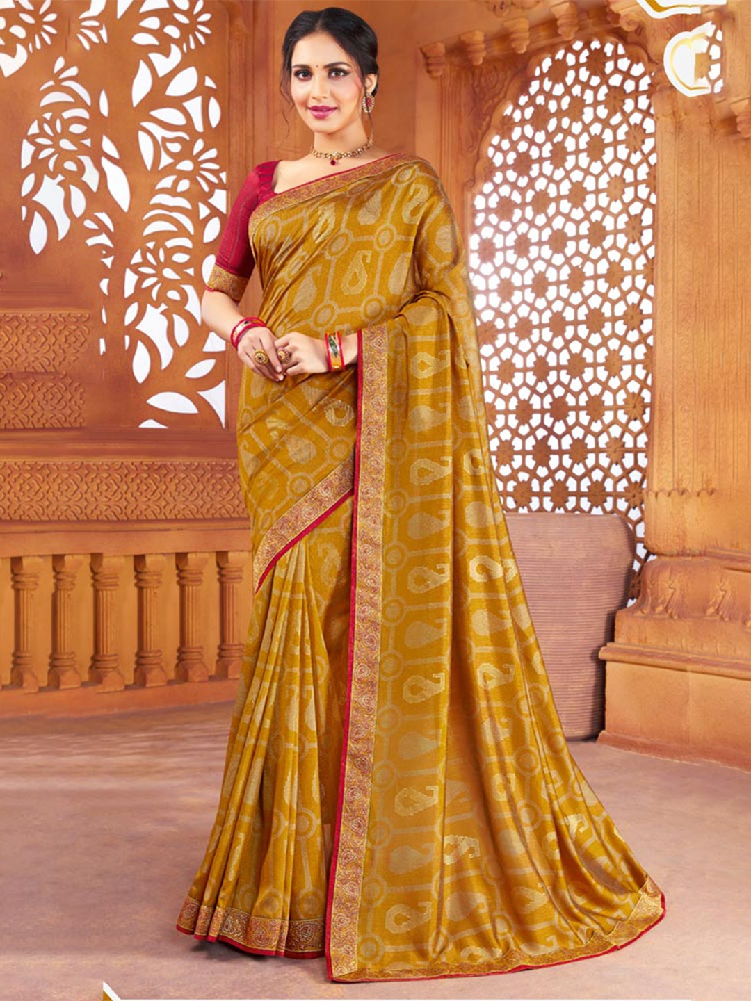 

Vishal Prints Ethnic Motifs Zari Saree, Mustard