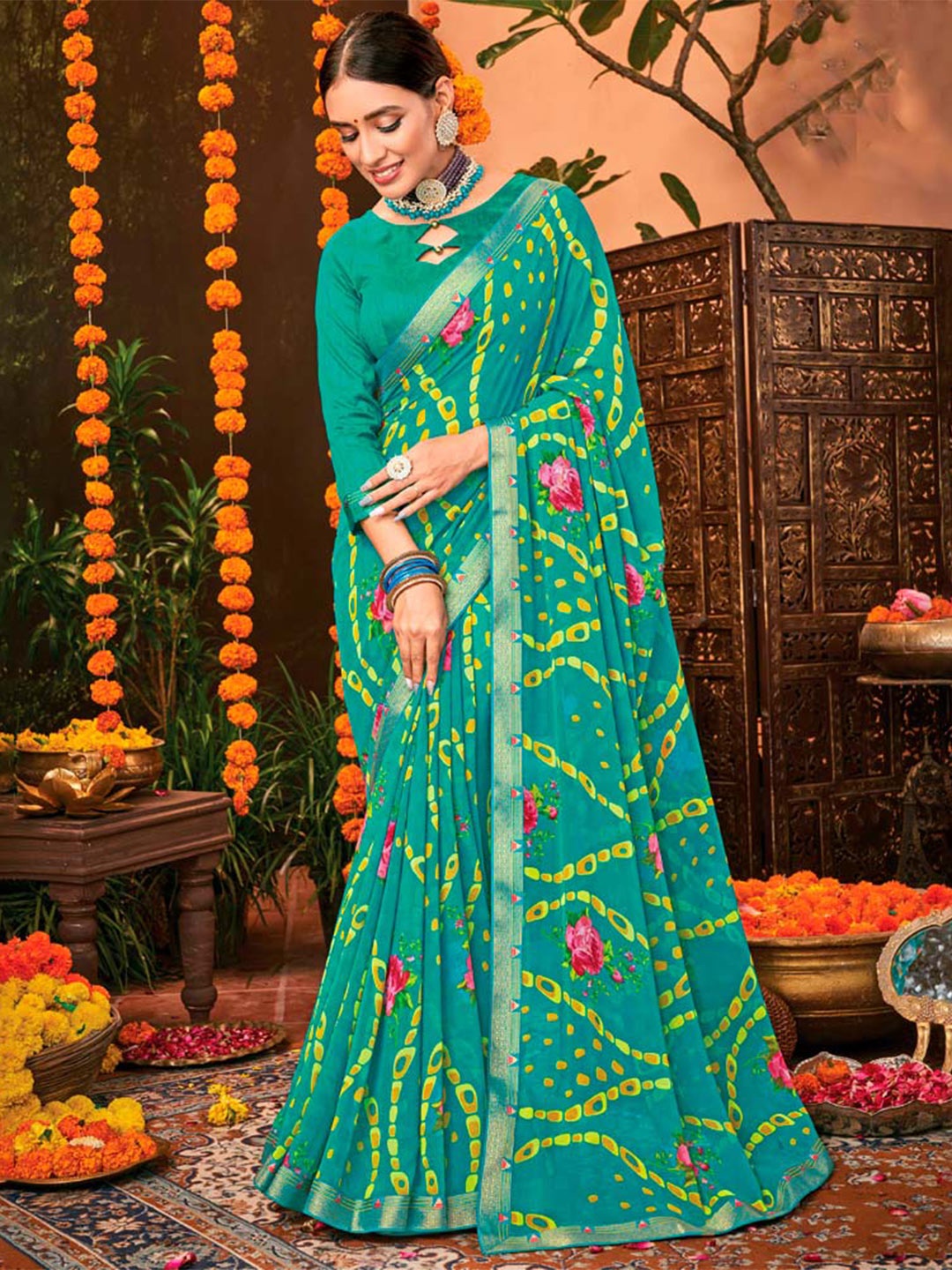 

Vishal Prints Floral Printed Zari Saree, Teal