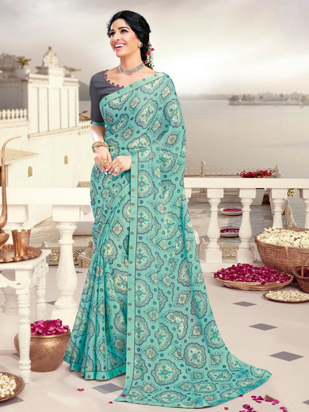 

Vishal Prints Ethnic Motifs Embroidered Poly Crepe Saree With Blouse Piece, Turquoise blue
