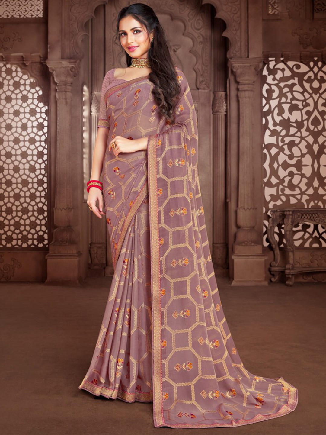 

Vishal Prints Ethnic Motifs Printed Embellished Saree, Red