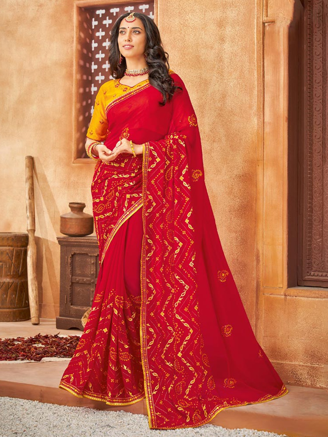 

Vishal Prints Ethnic Motifs Embroidered Saree, Red