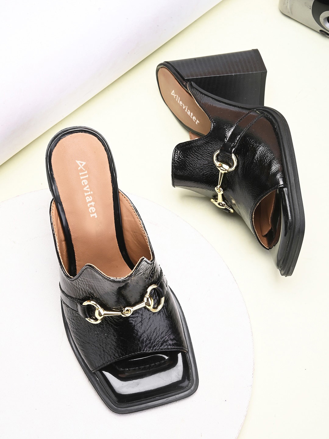 

Alleviater Buckle Embellished Leather Block Heel Mules, Black