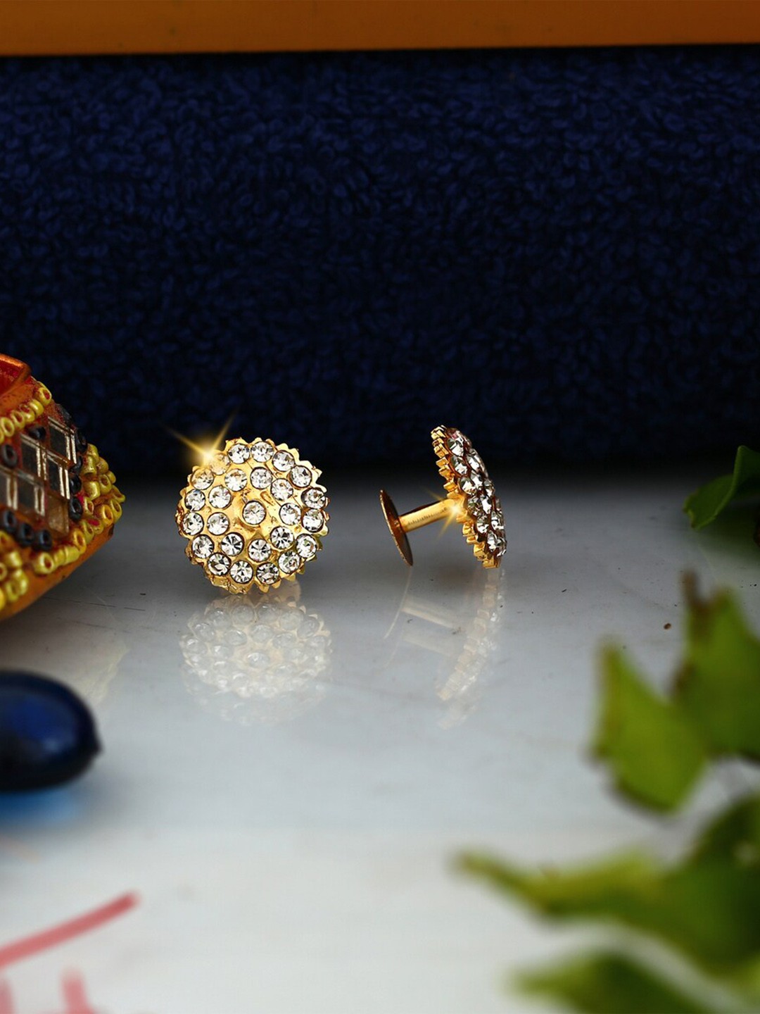 

Vighnaharta Gold-Plated Floral Studs Earrings