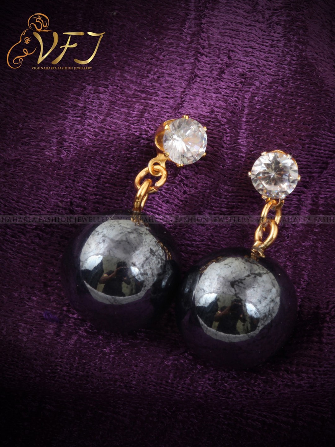 

Vighnaharta Gold-Plated Drop Earrings