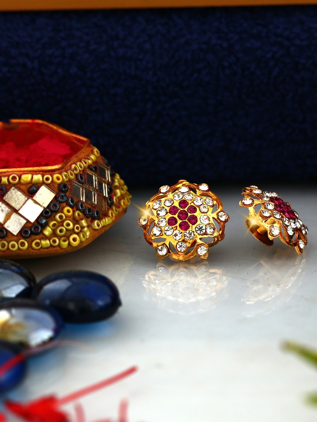 

Vighnaharta Gold-Plated Floral Studs Earrings