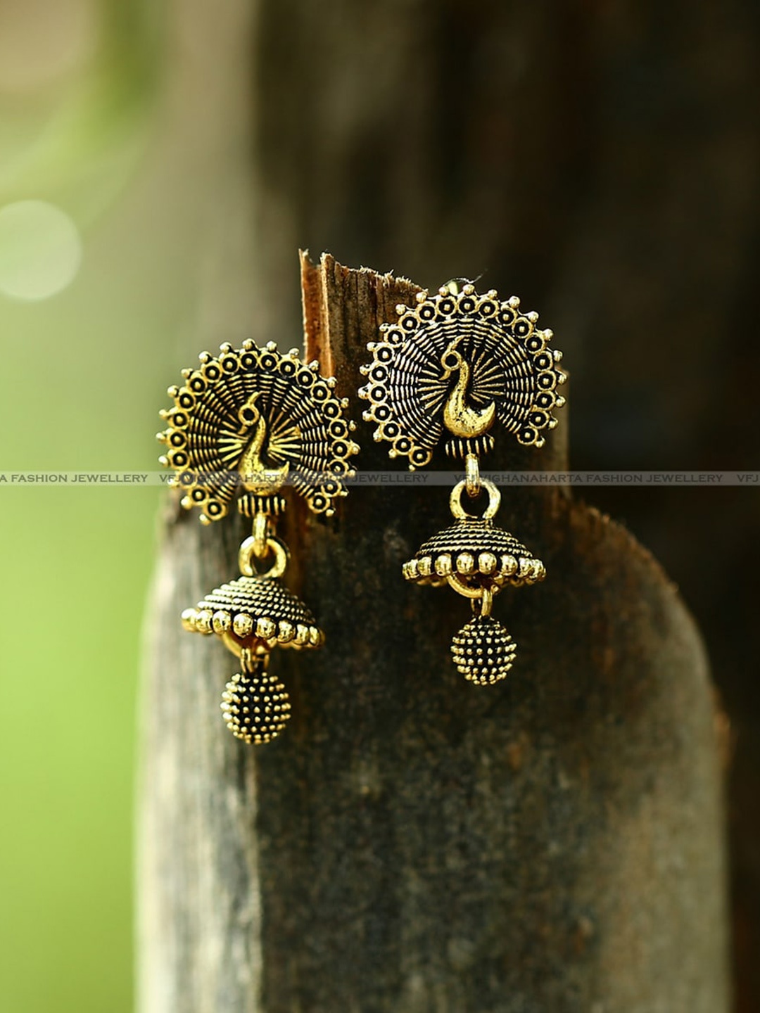 

Vighnaharta Gold-Plated Peacock Shaped Jhumkas