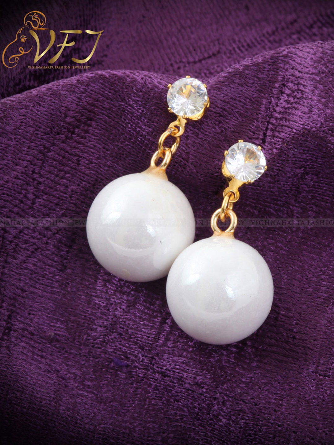 

Vighnaharta Gold-Plated Floral Drop Earrings