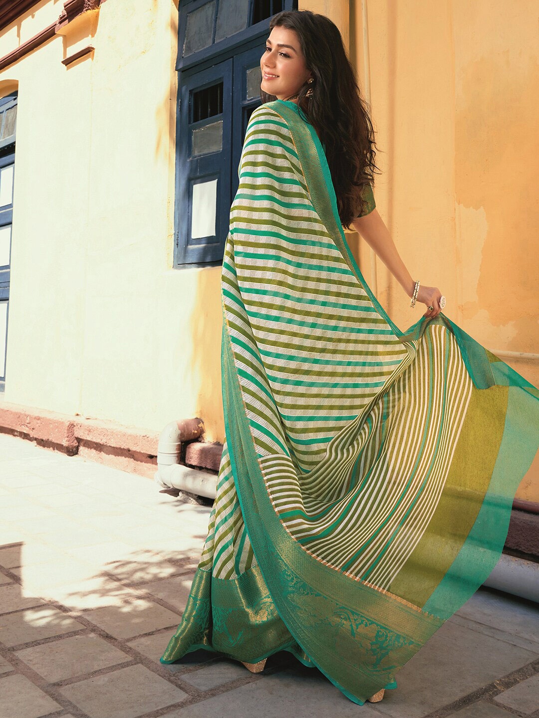 

Satrani Cream-Coloured & Green Striped Zari Detailed Saree