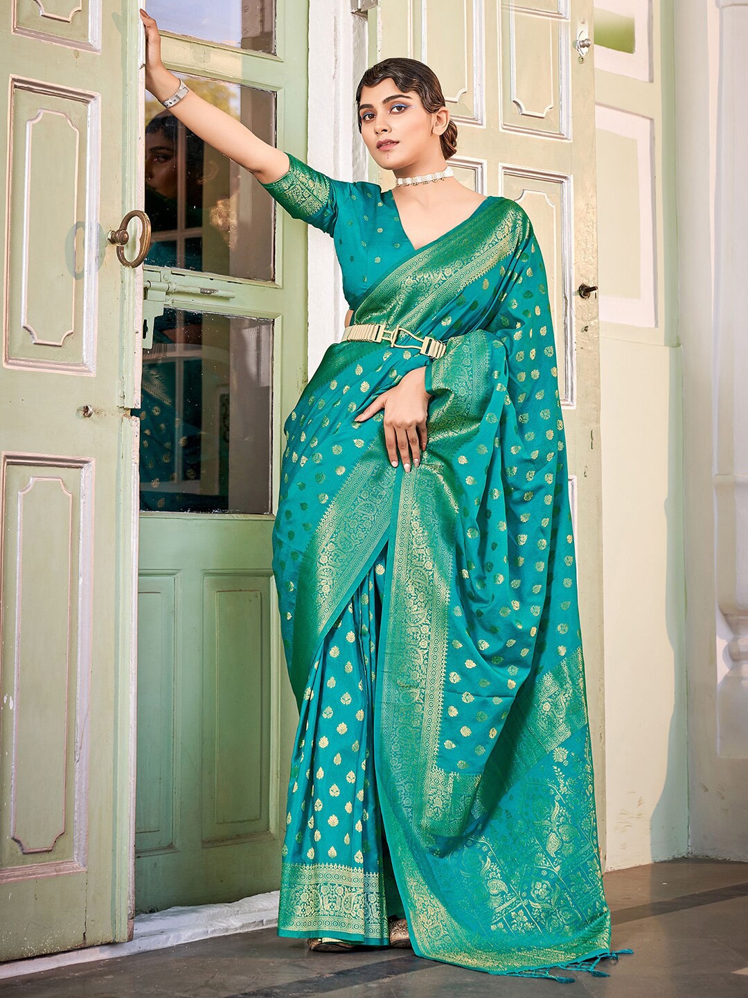 

Satrani Turquoise Blue & Gold Ethnic Motif Zari Poly Georgette Banarasi Saree