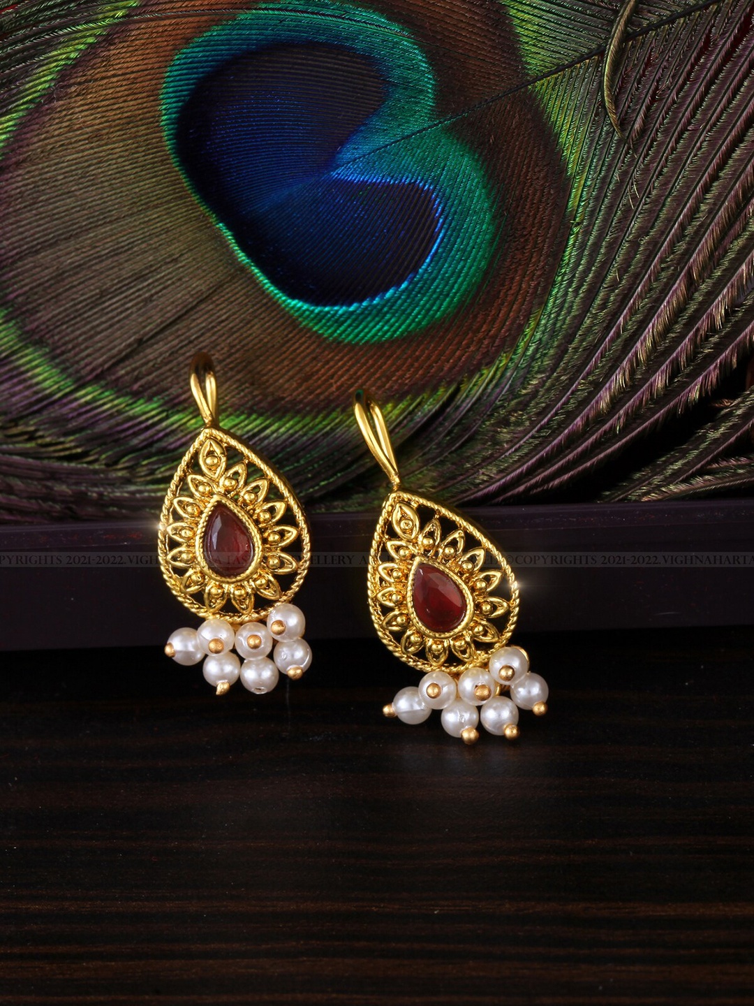 

Vighnaharta Gold-Plated Contemporary Drop Earrings