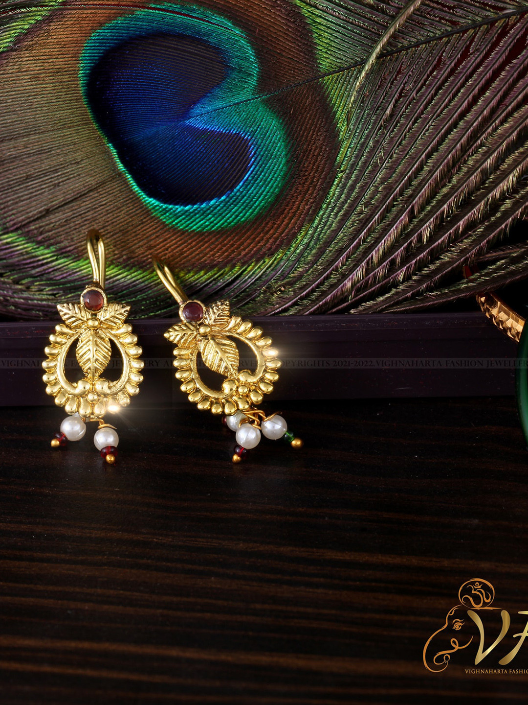 

Vighnaharta Gold-Plated Contemporary Drop Earrings