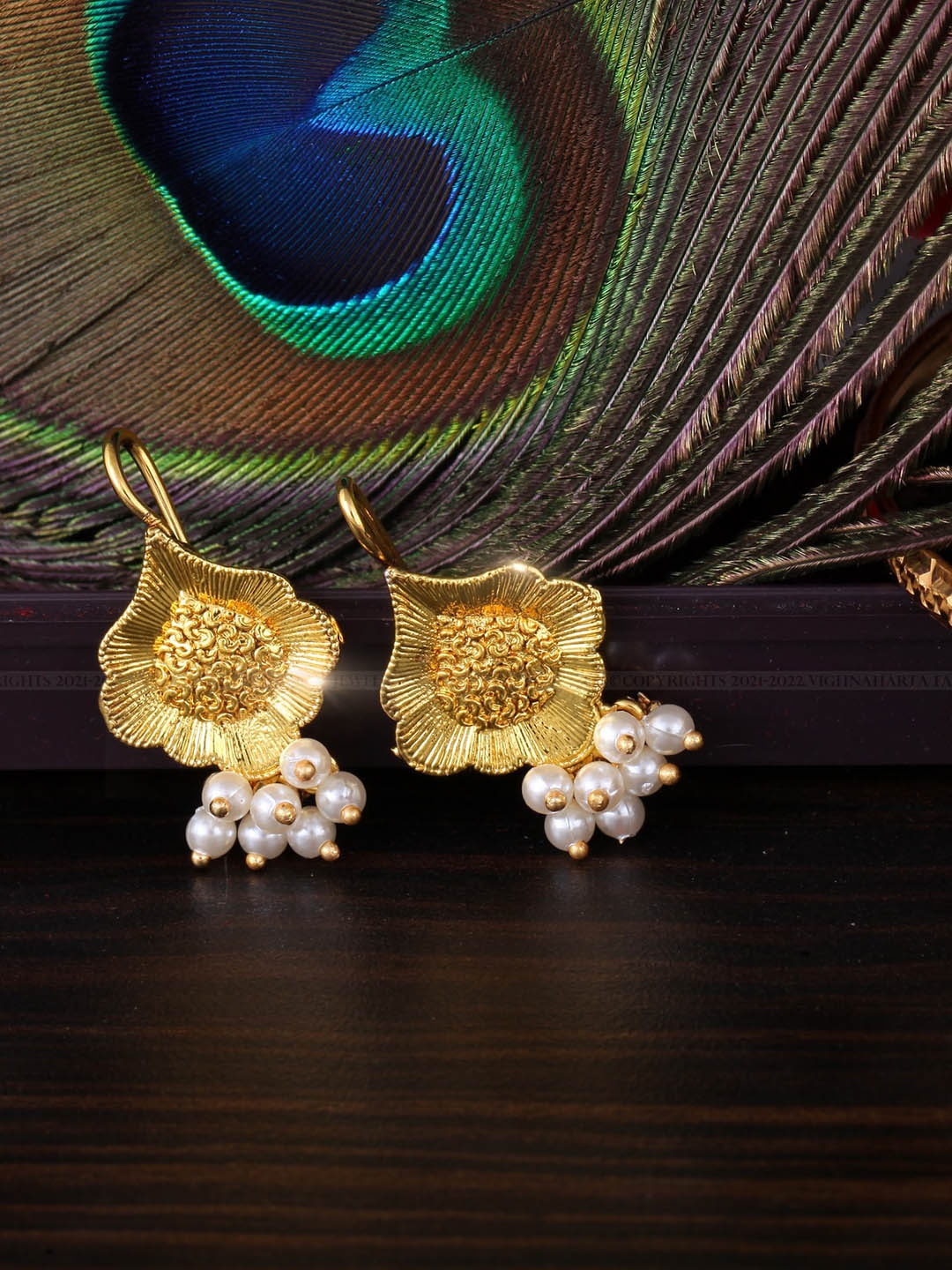 

Vighnaharta Gold-Plated Contemporary Jhumkas Earrings
